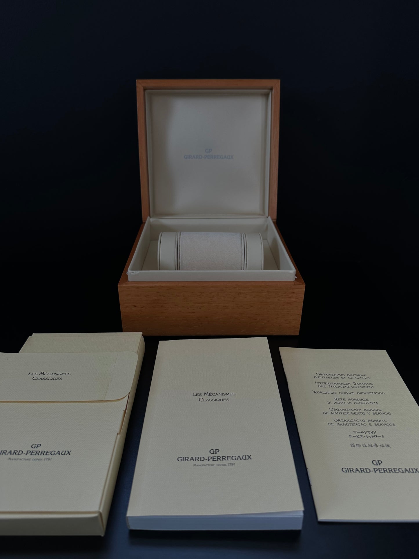 Girard Perregaux Sea Hawk II Ref. 4990 Men's Watch with a 42mm stainless steel case, black dial featuring a date and power reserve indicator, unidirectional rotating bezel, and black rubber strap with deployment buckle, in good condition with light signs of wear, available at The Watch Trader, Madison, CT.