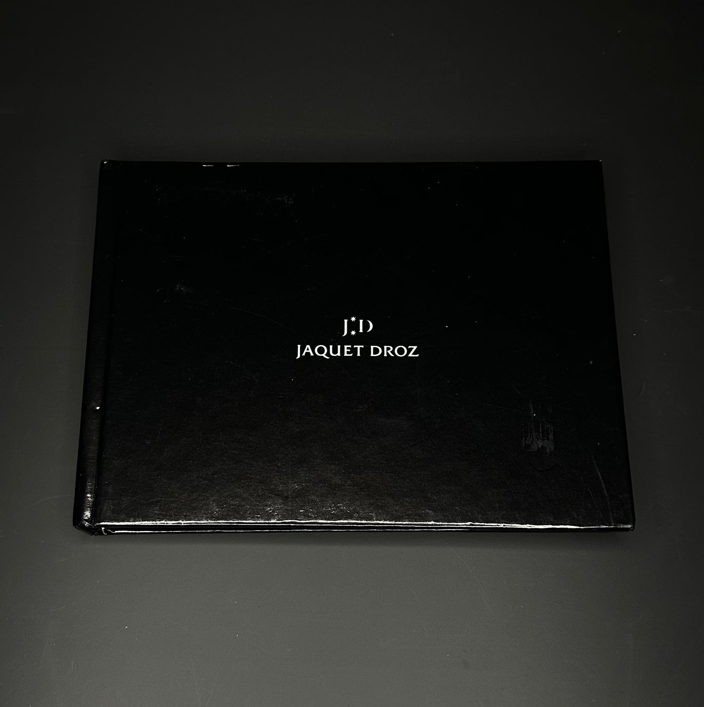 Jaquet Droz Grande Seconde Reserve de Marche Limited Edition Ref. J027035401 with a 44mm black ceramic case, black dial, black ceramic bezel, and black rubber strap, in very good condition with little to no signs of wear, includes warranty paper and booklet, available at The Watch Trader, Madison, CT.