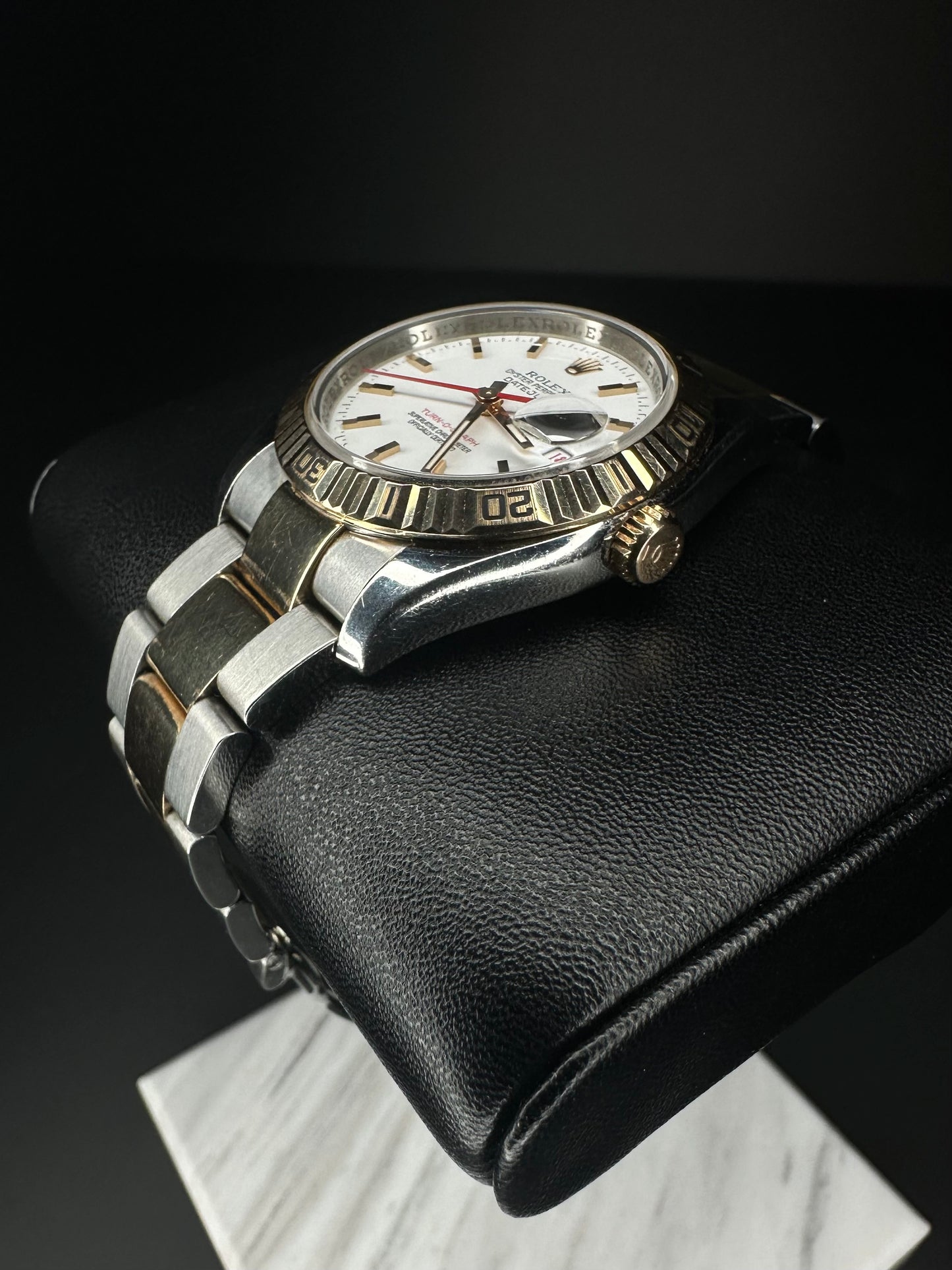 Rolex Datejust Turn-O-Graph 116261 men's automatic watch, featuring a 36mm stainless steel and rose gold case with a classic Oyster bracelet. This elegant timepiece combines the iconic Datejust design with a rotating bezel, ideal for collectors seeking a versatile luxury watch. Available from The Watch Trader CT.