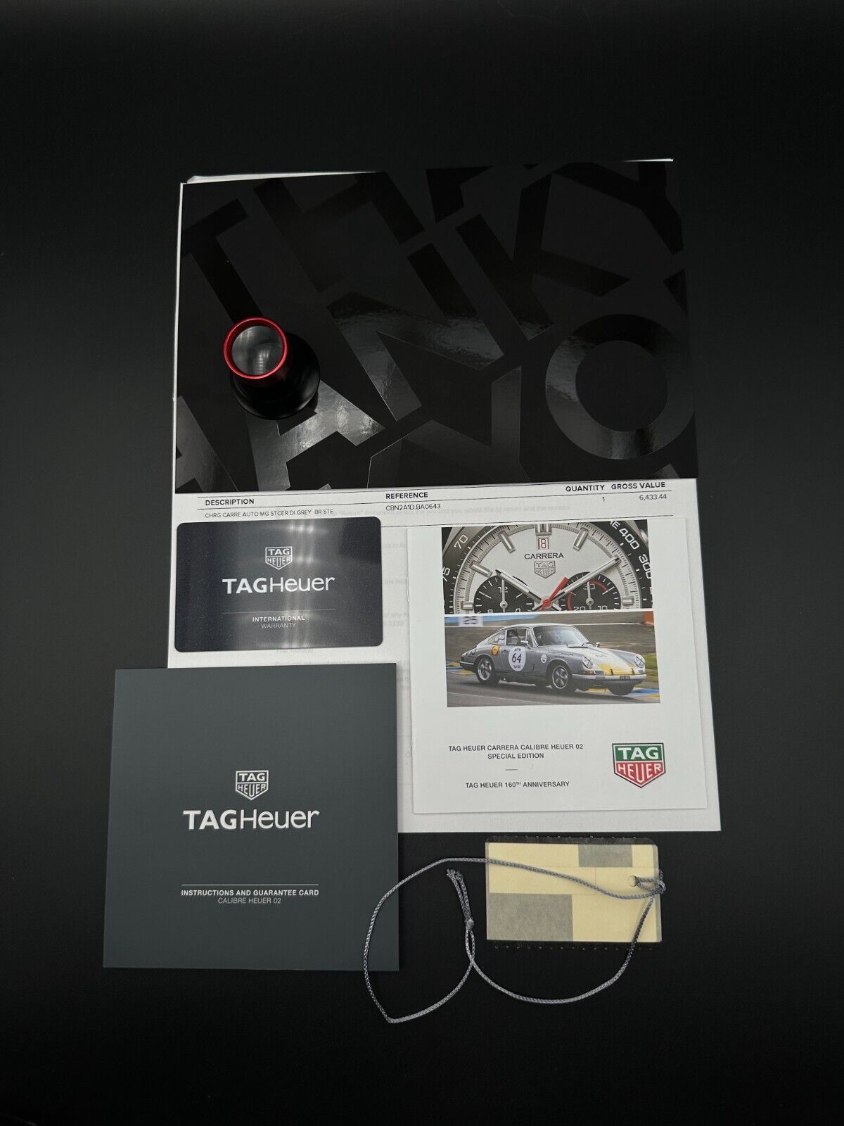 TAG Heuer Carrera Anniversary Limited Edition Men's Watch CBN2A1D.BA0643, 2020 model, featuring a 44mm stainless steel case, silver dial, and black ceramic tachymeter bezel. Comes with a stainless steel bracelet and push-button deployant clasp. In very good condition with minimal signs of wear. Available at The Watch Trader, Madison, Connecticut.