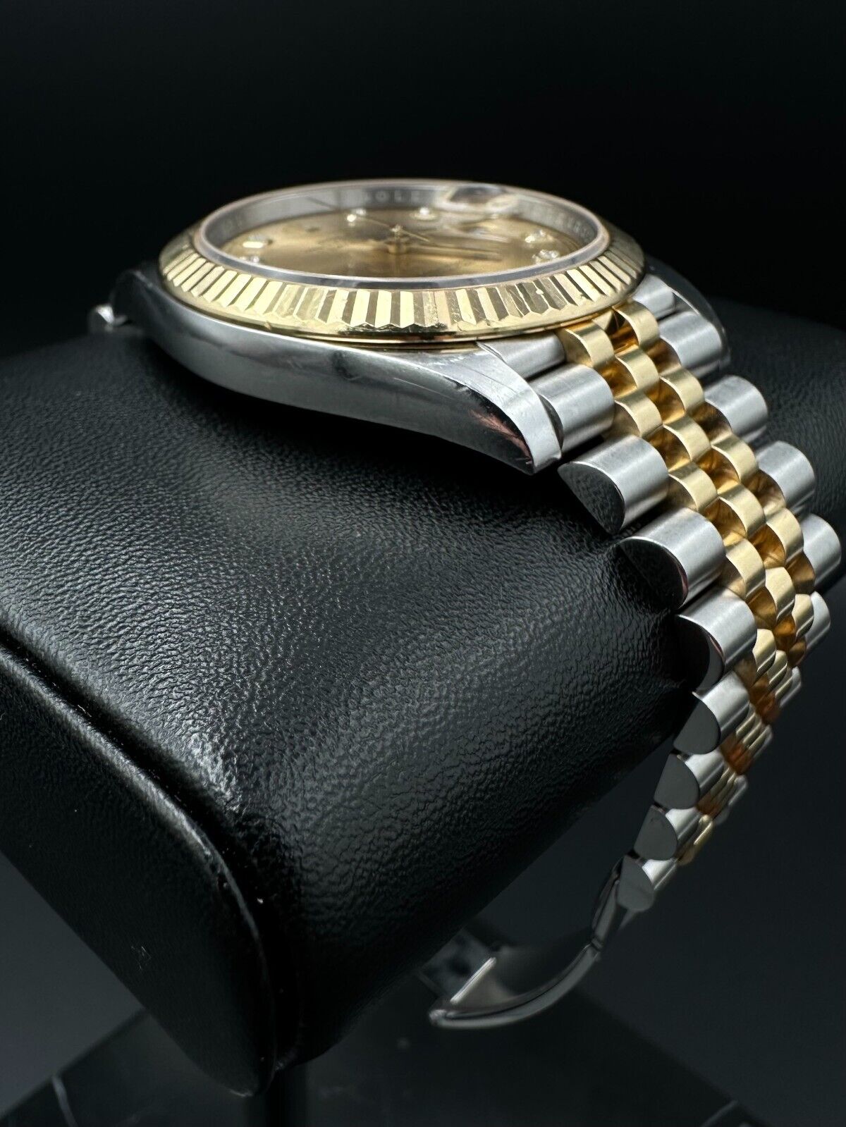 Rolex Datejust 41 model 126333, featuring a gold and stainless steel Jubilee bracelet and a champagne diamond dial, 2022 release. This luxurious 41mm automatic watch combines classic elegance with modern sophistication, ideal for collectors and enthusiasts seeking a statement timepiece. Available from The Watch Trader in Madison, CT.