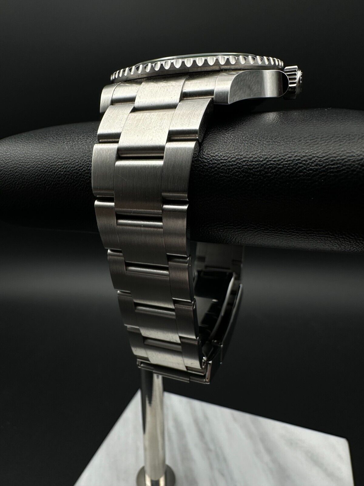 Rolex Submariner Date 126610LV "Starbucks" Men's Watch, 2024 model, featuring a 41mm stainless steel case, black dial, and green ceramic unidirectional rotating bezel. Comes with a stainless steel Rolex Oyster bracelet. Fair condition with visible signs of wear. Available at The Watch Trader, Madison, Connecticut.