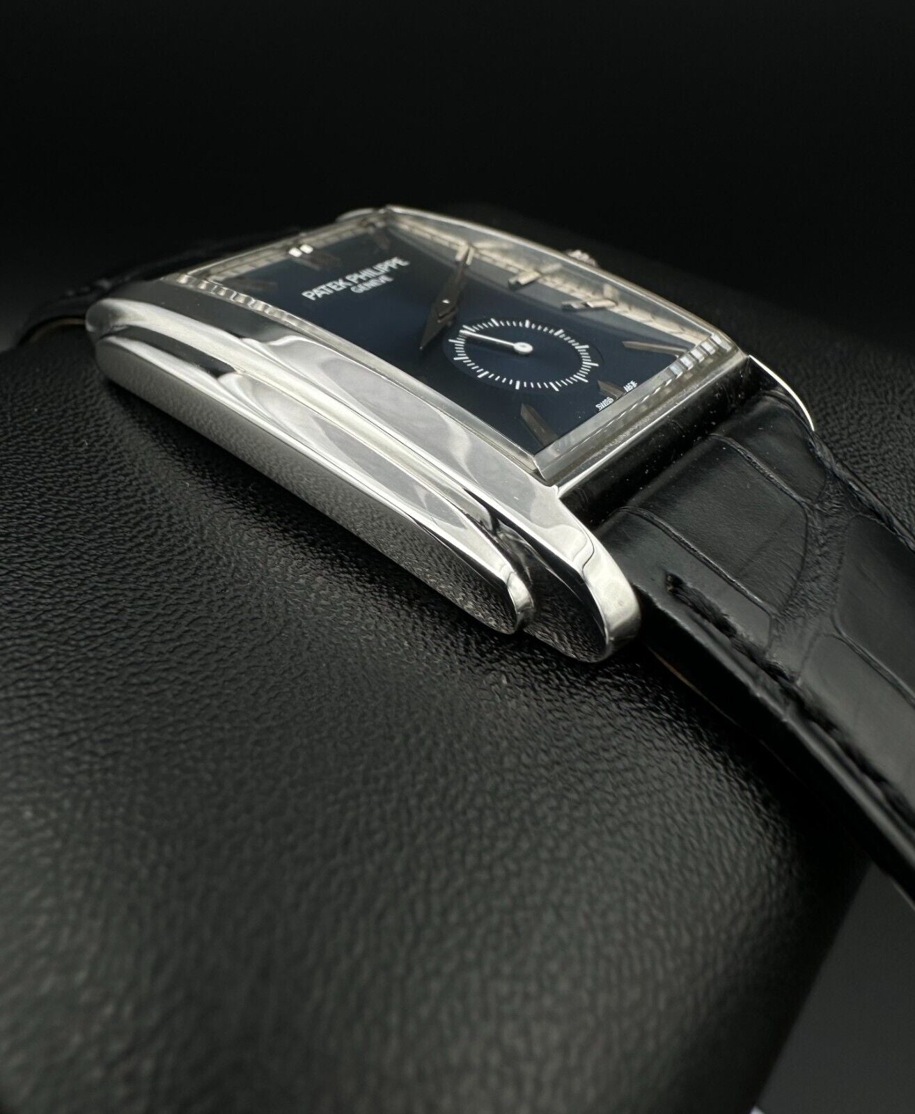 Patek Philippe Gondolo 5124G men's watch, featuring an elegant 43mm 18k white gold case and a striking blue dial. This luxury timepiece blends sophisticated design with Patek Philippe's renowned craftsmanship, ideal for collectors seeking a prestigious, limited-edition watch. Available from The Watch Trader in Madison, Connecticut.