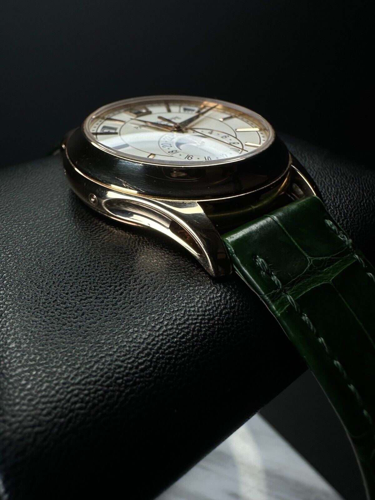 Patek Philippe 5205R-001 Complications Annual Calendar Moonphase men's watch, featuring an 18k rose gold case and elegant blue dial. Released in 2018, this luxury timepiece combines the precision of an annual calendar with the elegance of a moonphase complication, perfect for collectors seeking a sophisticated and rare Patek Philippe watch. Available from The Watch Trader in Madison, Connecticut.