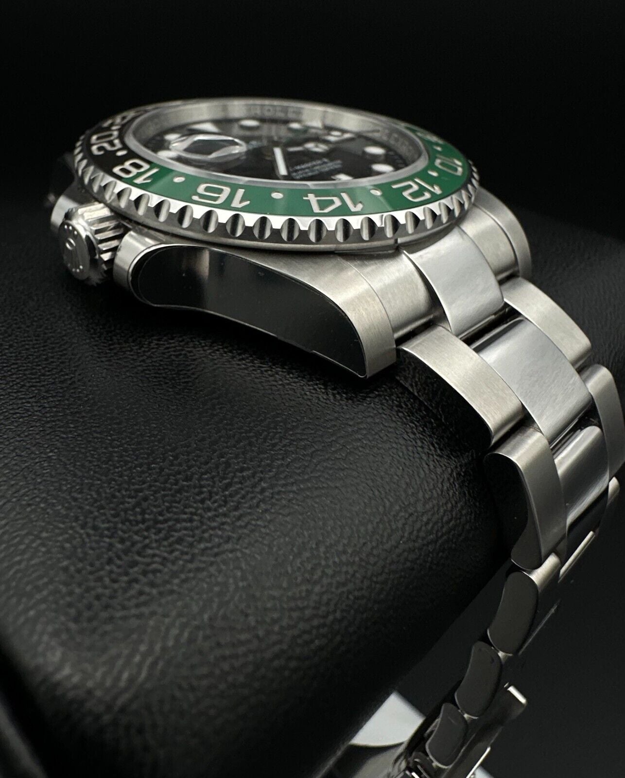 Rolex GMT-Master II 126720VTNR Sprite men's watch, featuring the bold green and black 'Sprite' bezel, stainless steel oyster bracelet, and 2024 release. This 41mm automatic timepiece combines modern style with classic GMT functionality, ideal for collectors and travelers seeking a versatile luxury watch. Available from The Watch Trader CT.