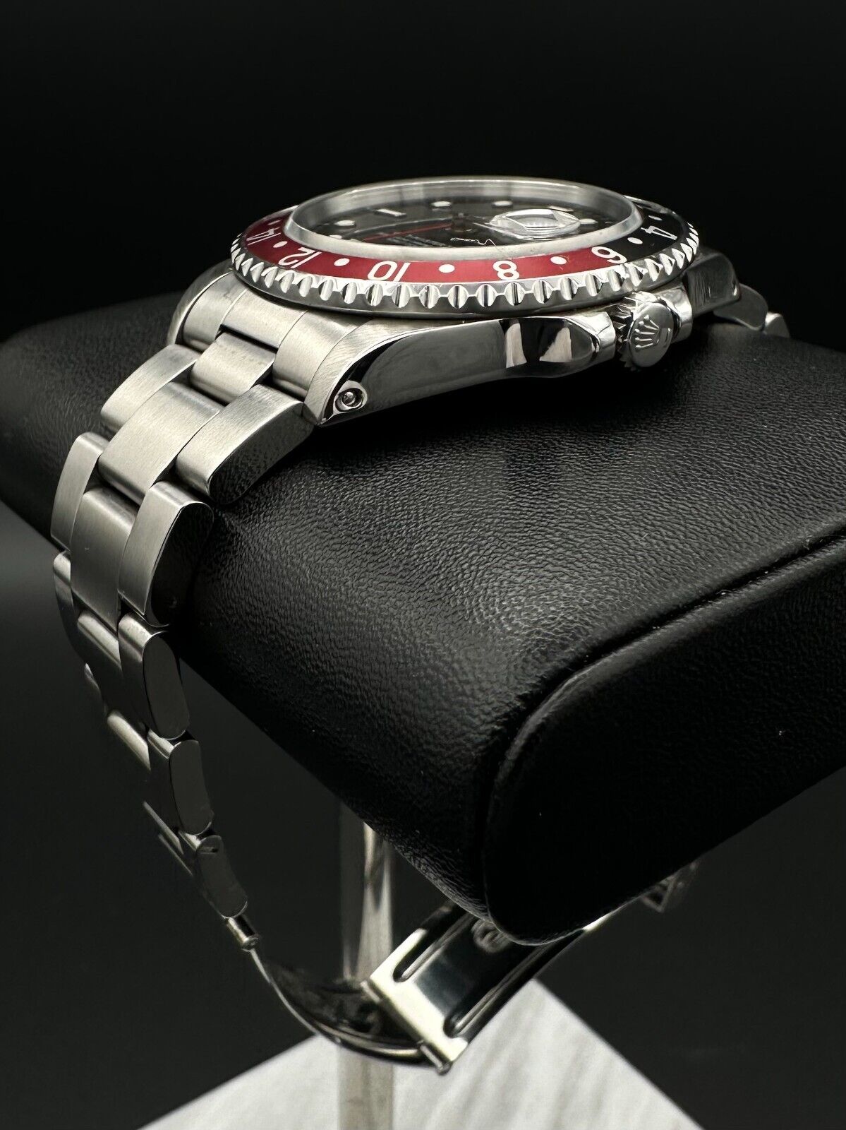 Rolex GMT-Master II men's automatic watch, model 16710, featuring the classic 'Coke' bezel and stainless steel oyster bracelet, 1993 release. This iconic 40mm timepiece combines functionality with a timeless design, perfect for collectors and enthusiasts of luxury watches. Available from The Watch Trader CT.