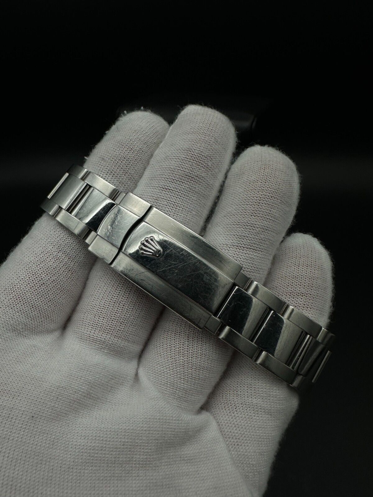 Rolex Datejust 36mm watch, model 116200, featuring a white Roman numeral dial and stainless steel Oyster bracelet. This classic automatic timepiece embodies refined elegance and versatility, perfect for collectors and enthusiasts seeking a timeless luxury watch. Available from The Watch Trader in Madison, Connecticut.