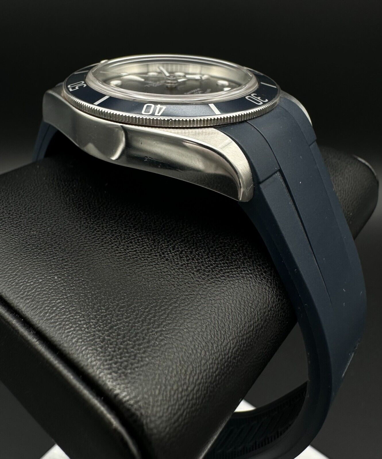 Tudor Heritage Black Bay men's automatic watch, model 79220B, with distinctive black 'Smiley' dial and 2014 release. Features a classic 41mm stainless steel case and vintage-inspired design, ideal for collectors of iconic timepieces. Available from The Watch Trader CT.