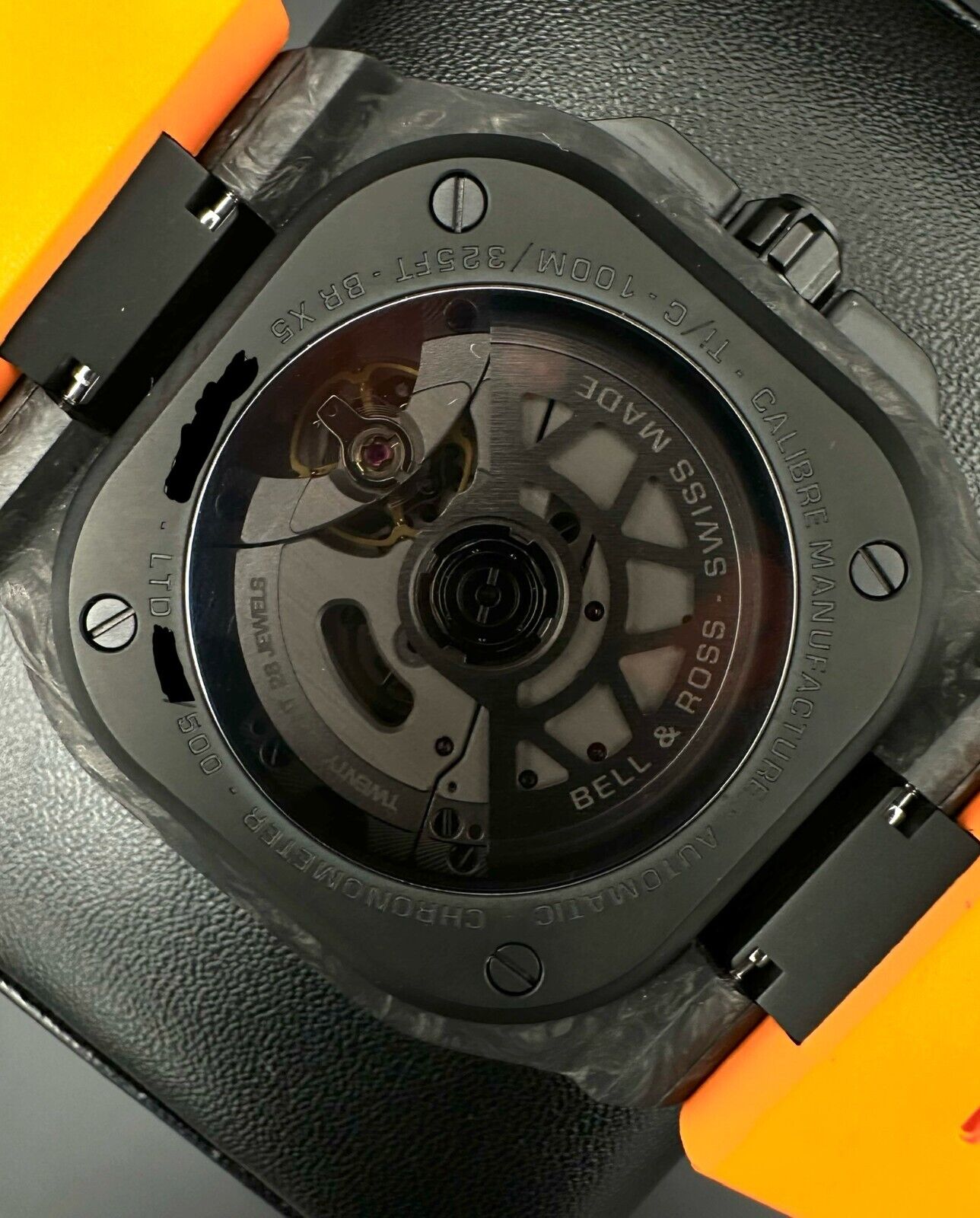 Bell & Ross Limited Edition BR-X5 Carbon Orange 41mm men's watch, model BRX5R-BO-TC/SRB, featuring a striking orange dial, carbon case, and bold, sporty design. Ideal for collectors seeking exclusive, high-performance timepieces. Available from The Watch Trader CT