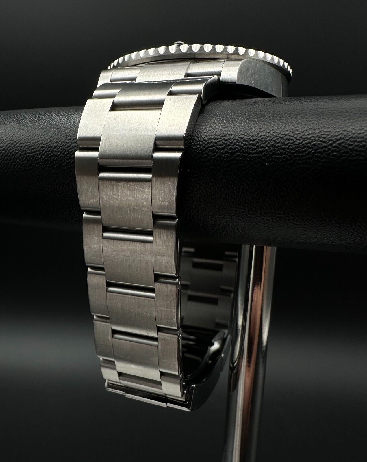 Rolex Submariner Date 126610LV "Starbucks" Men's Watch, 2024 model, featuring a 41mm stainless steel case, black dial, and green ceramic unidirectional rotating bezel. Comes with a stainless steel Rolex Oyster bracelet. Fair condition with visible signs of wear. Available at The Watch Trader, Madison, Connecticut.