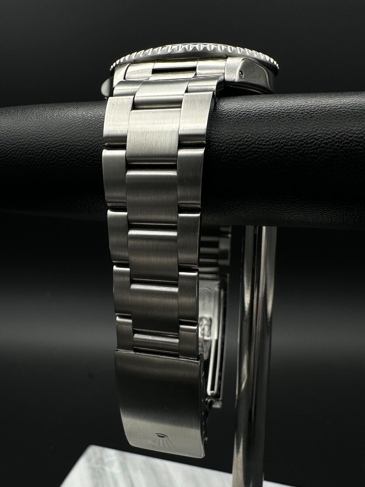 Rolex GMT-Master II men's automatic watch, model 16710, featuring the classic 'Coke' bezel and stainless steel oyster bracelet, 1993 release. This iconic 40mm timepiece combines functionality with a timeless design, perfect for collectors and enthusiasts of luxury watches. Available from The Watch Trader CT.