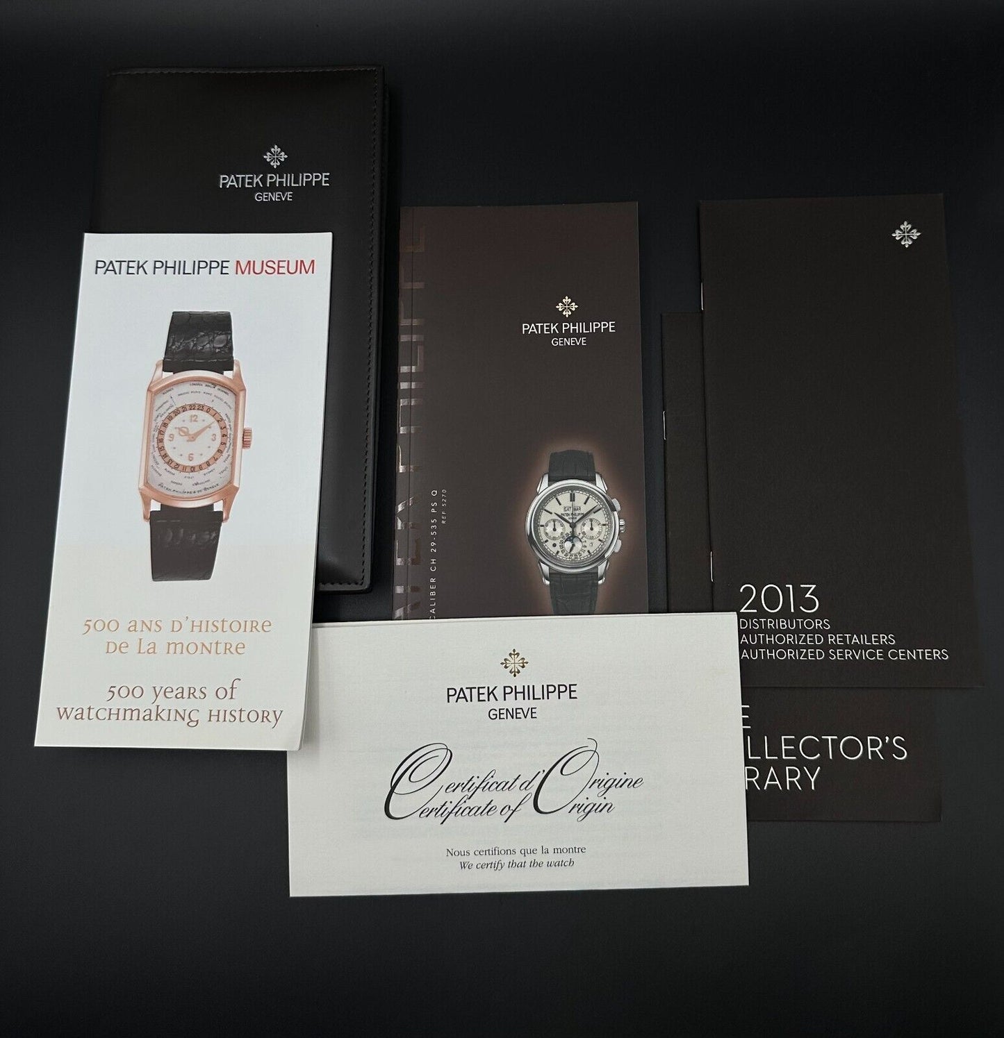 Patek Philippe Grand Complications Perpetual Calendar Chronograph 5270G, 2014 model, featuring a 41mm white gold case, blue dial, and black leather strap. Fair condition with visible signs of wear. Includes inner and outer boxes, booklets, and warranty papers. Available at The Watch Trader, Madison, Connecticut.