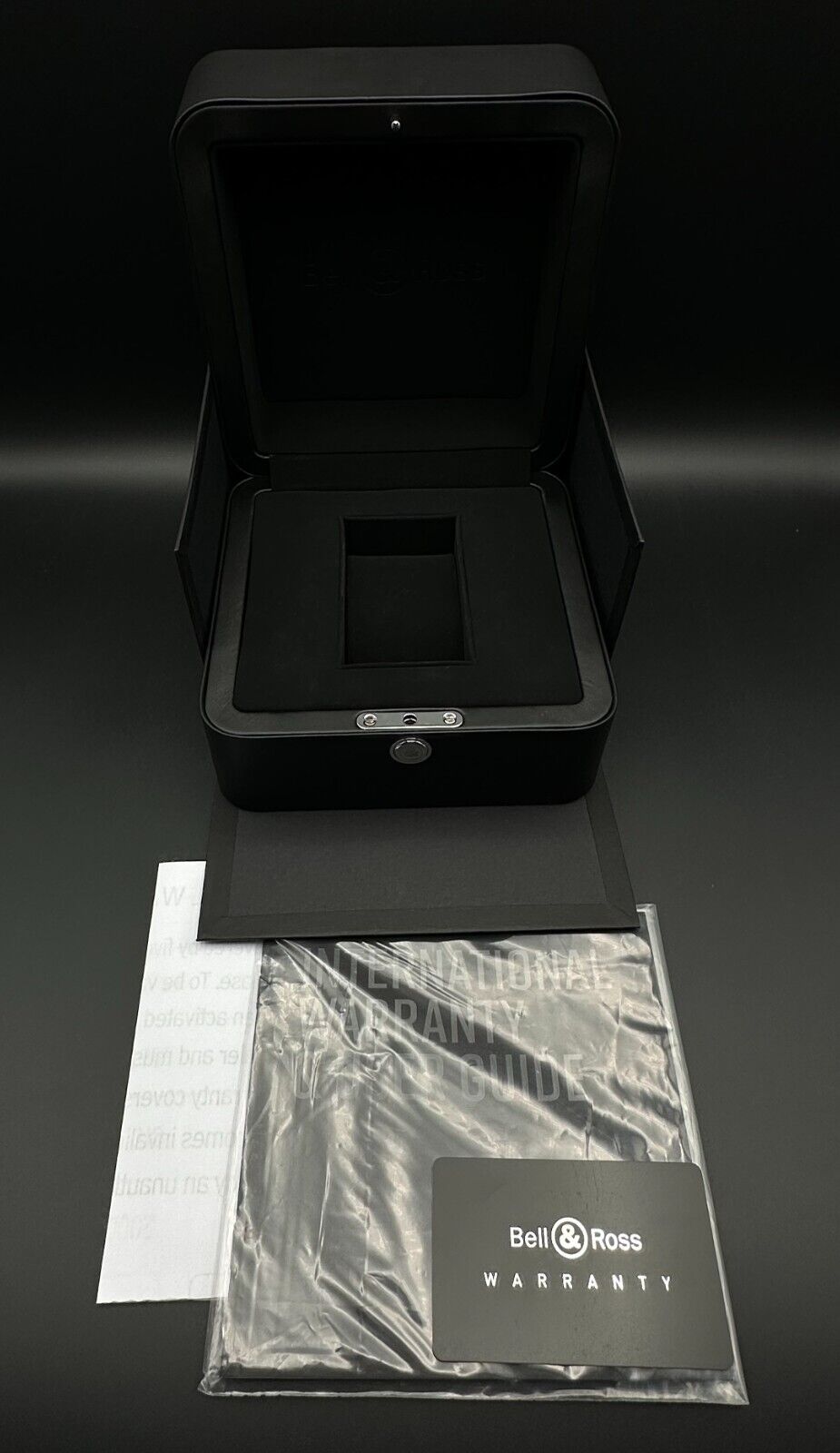 Bell & Ross Limited Edition BR-X5 Carbon Orange BRX5R-BO-TC/SRB, 2023 model, featuring a 41mm Grade 2 microblasted titanium case with DLC finish, matte black dial, and orange rubber strap with folding buckle. The dial has applique indices filled with Super-LumiNova® and skeletonized metal hands. The fixed bezel is made of Grade 2 microblasted titanium with a matt carbon fiber insert. Very good condition with minimal signs of wear. Limited edition of 500 pieces. Includes inner and outer boxes, warranty card,