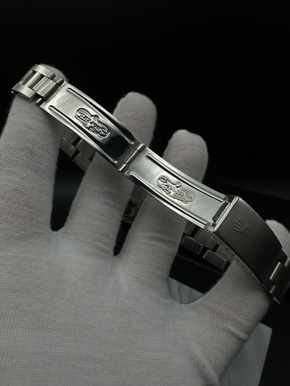 Rolex Air-King 5500, 1987 model, featuring a 34mm stainless steel case, silver dial, and stainless steel Rolex Oyster bracelet. Fair condition with noticeable signs of wear. Includes warranty papers and service certificate. Available at The Watch Trader, Madison, Connecticut.