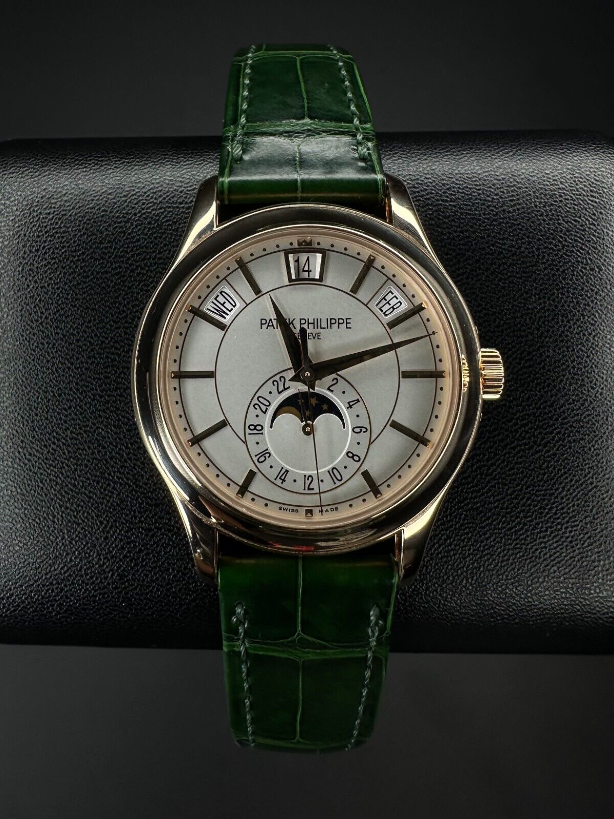 Patek Philippe 5205R-001 Complications Annual Calendar Moonphase men's watch, featuring an 18k rose gold case and elegant blue dial. Released in 2018, this luxury timepiece combines the precision of an annual calendar with the elegance of a moonphase complication, perfect for collectors seeking a sophisticated and rare Patek Philippe watch. Available from The Watch Trader in Madison, Connecticut.