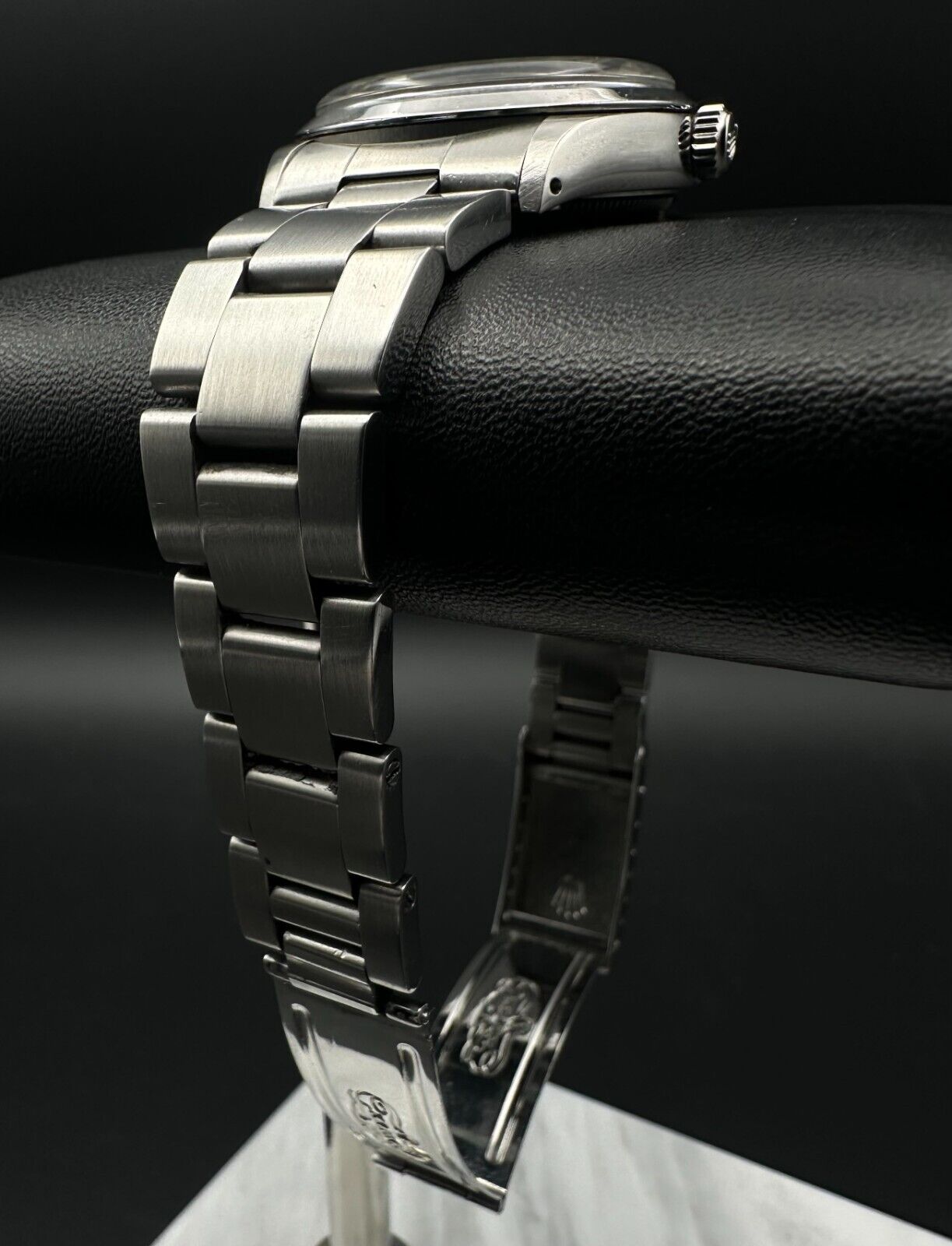 Rolex Air-King 5500, 1987 model, featuring a 34mm stainless steel case, silver dial, and stainless steel Rolex Oyster bracelet. Fair condition with noticeable signs of wear. Includes warranty papers and service certificate. Available at The Watch Trader, Madison, Connecticut.