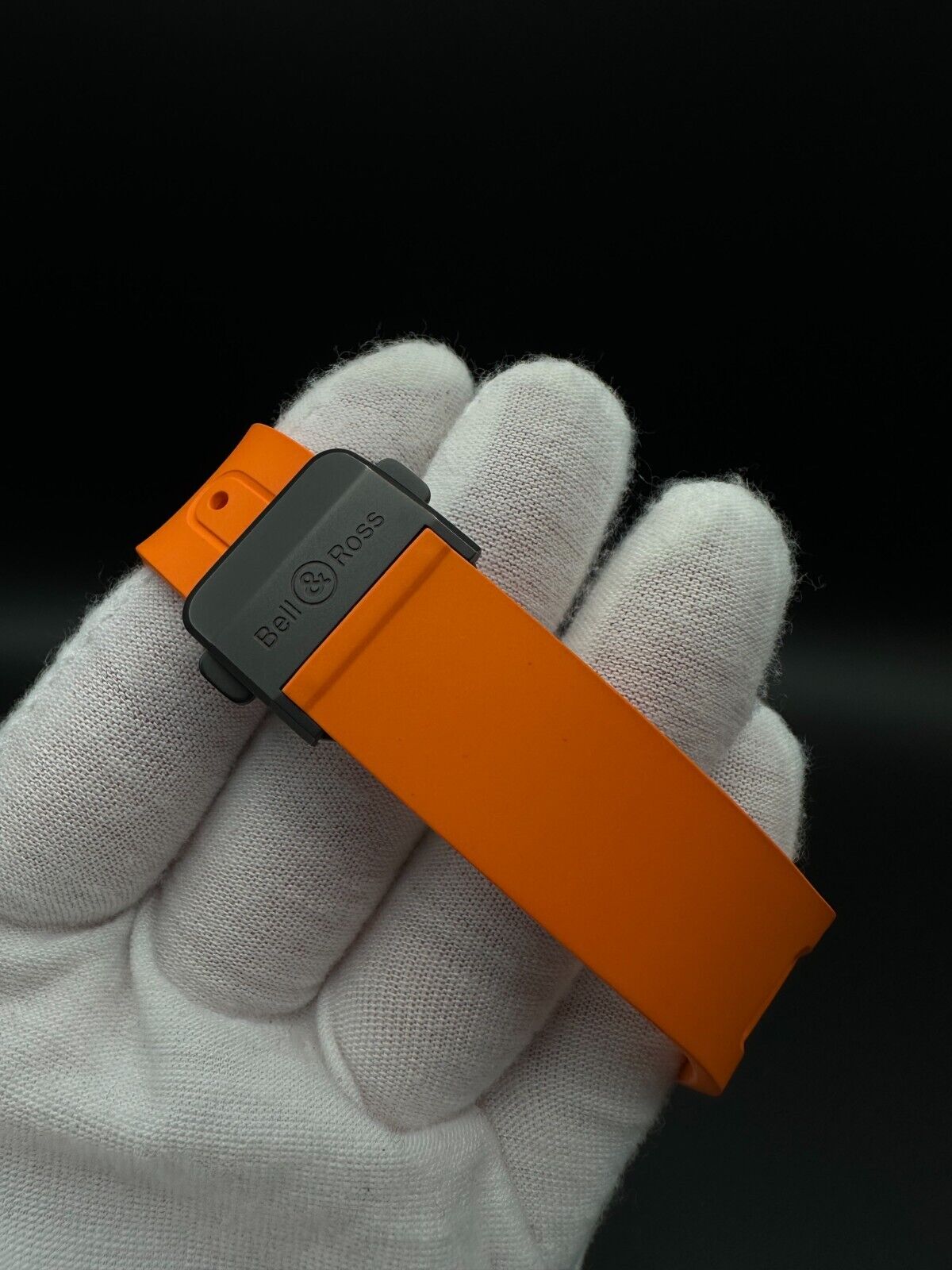 Bell & Ross Limited Edition BR-X5 Carbon Orange BRX5R-BO-TC/SRB, 2023 model, featuring a 41mm Grade 2 microblasted titanium case with DLC finish, matte black dial, and orange rubber strap with folding buckle. The dial has applique indices filled with Super-LumiNova® and skeletonized metal hands. The fixed bezel is made of Grade 2 microblasted titanium with a matt carbon fiber insert. Very good condition with minimal signs of wear. Limited edition of 500 pieces. Includes inner and outer boxes, warranty card,