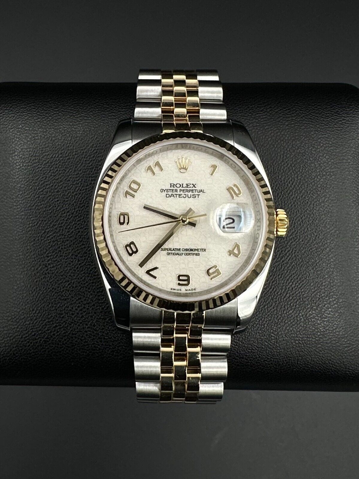 Rolex Datejust 36mm automatic watch, model 116233, featuring a white Anniversary dial and Super Jubilee bracelet. This sophisticated timepiece combines elegant design with Rolex's signature craftsmanship, ideal for collectors and enthusiasts seeking a refined luxury watch. Available from The Watch Trader in Madison, Connecticut