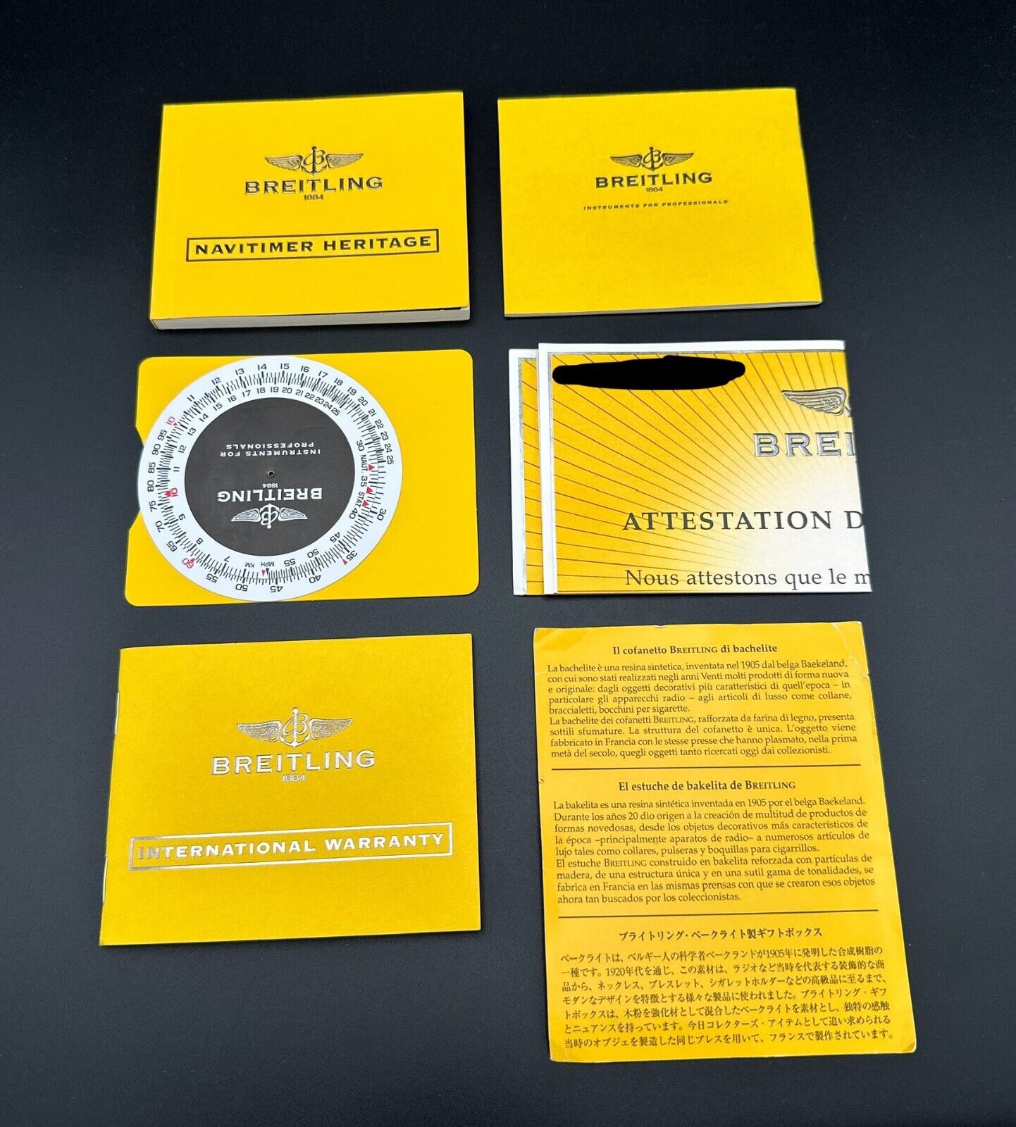 Breitling Navitimer Heritage A3535024/B554, 2006 model, featuring a 43mm stainless steel case, black dial, and stainless steel bidirectional rotating bezel. Comes with a stainless steel bracelet. Fair condition with visible signs of wear. Includes warranty booklet, COSC certificate, instruction booklet, slide rule instruction booklet, slide rule, bakelite certificate, and microfiber cloth. Available at The Watch Trader, Madison, Connecticut.