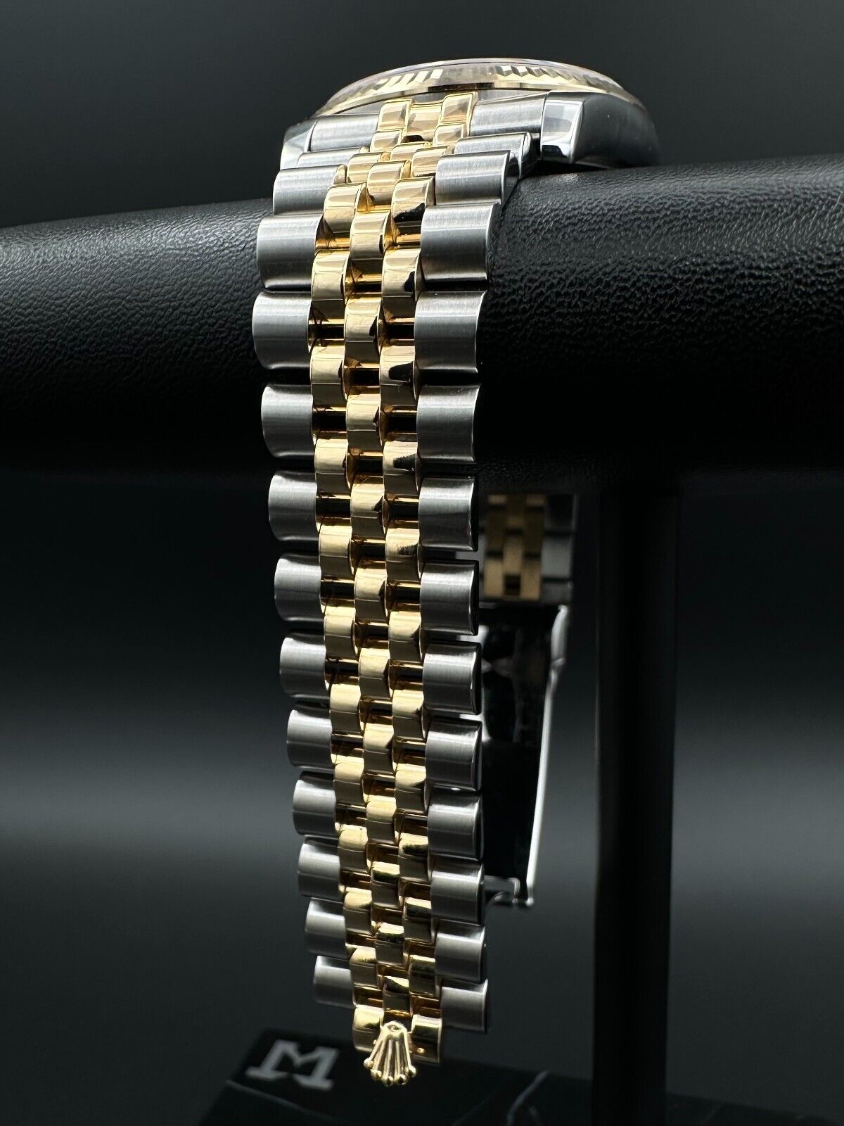 Rolex Datejust 36mm automatic watch, model 116233, featuring a white Anniversary dial and Super Jubilee bracelet. This sophisticated timepiece combines elegant design with Rolex's signature craftsmanship, ideal for collectors and enthusiasts seeking a refined luxury watch. Available from The Watch Trader in Madison, Connecticut