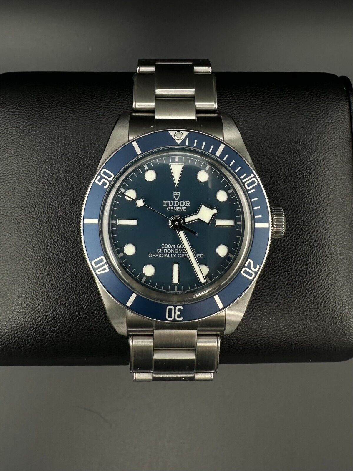 Tudor Black Bay Fifty-Eight Ref. 79030B Stainless Steel 39mm Automatic Watch from 2020, featuring a blue dial, unidirectional rotatable bezel with a 60-minute graduated disc in matte blue anodized aluminum, and silver gilded markings, paired with a Tudor stainless steel bracelet, in fair condition with obvious signs of wear, available at The Watch Trader, Madison, CT.