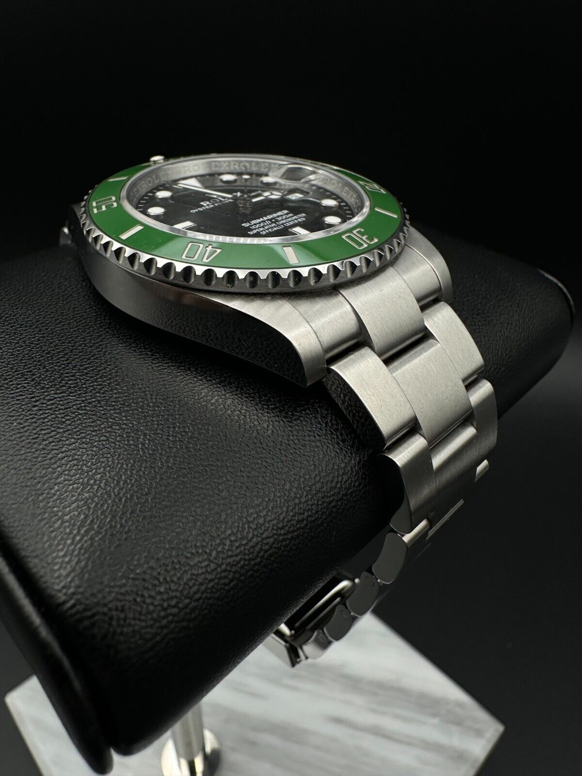 Rolex Submariner Date 126610LV "Starbucks" Men's Watch, 2024 model, featuring a 41mm stainless steel case, black dial, and green ceramic unidirectional rotating bezel. Comes with a stainless steel Rolex Oyster bracelet. Fair condition with visible signs of wear. Available at The Watch Trader, Madison, Connecticut.