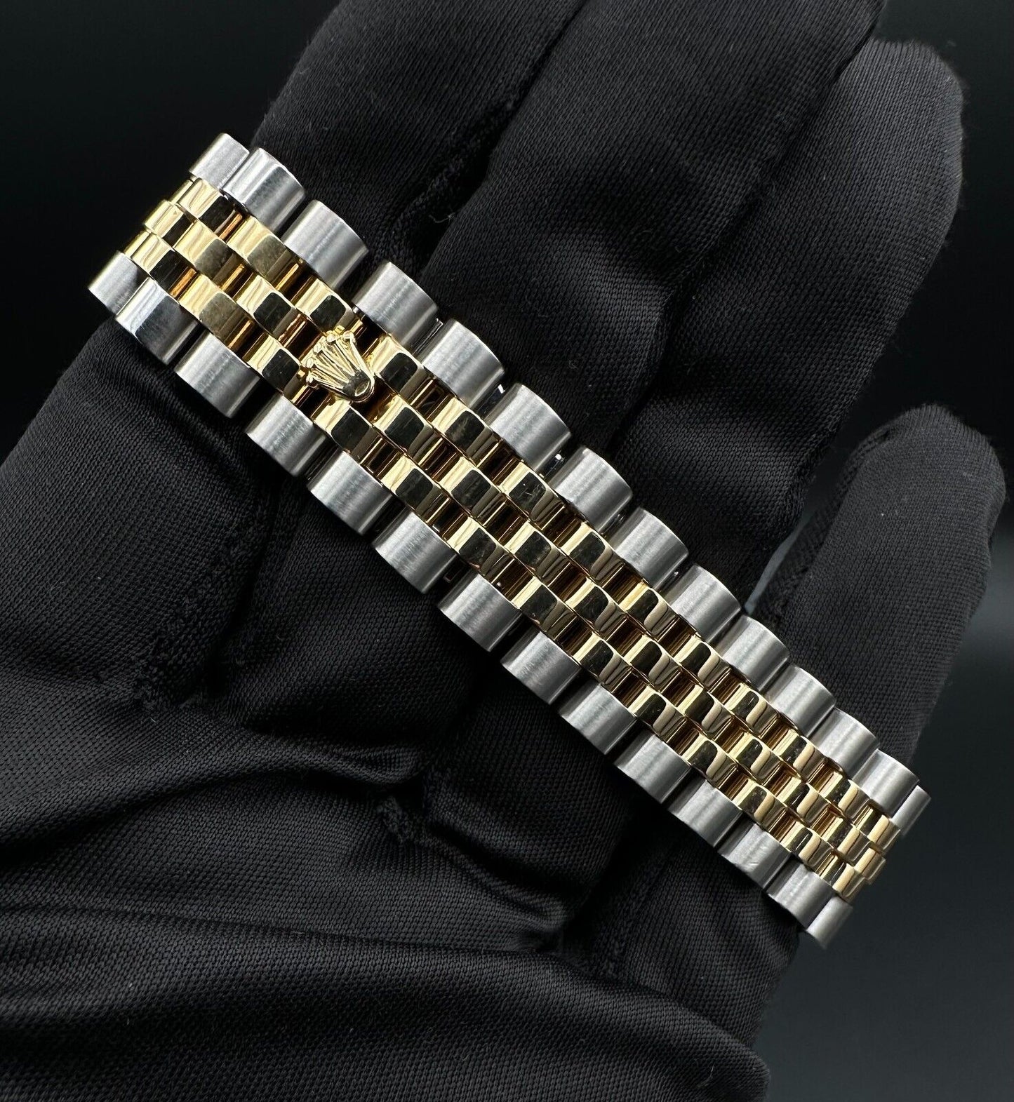 Rolex Datejust 36mm automatic watch, model 116233, featuring a white Anniversary dial and Super Jubilee bracelet. This sophisticated timepiece combines elegant design with Rolex's signature craftsmanship, ideal for collectors and enthusiasts seeking a refined luxury watch. Available from The Watch Trader in Madison, Connecticut