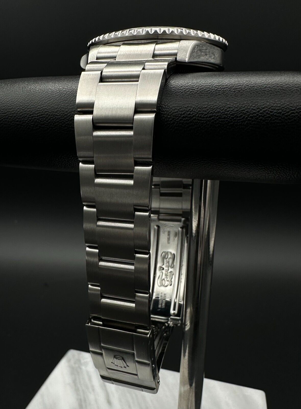 Rolex GMT-Master II automatic watch, model 16710, featuring the iconic 'Pepsi' bezel and stainless steel oyster bracelet, 2004 release. This 40mm timepiece combines functionality and classic style, ideal for collectors and travelers seeking a versatile luxury watch. Available from The Watch Trader CT.