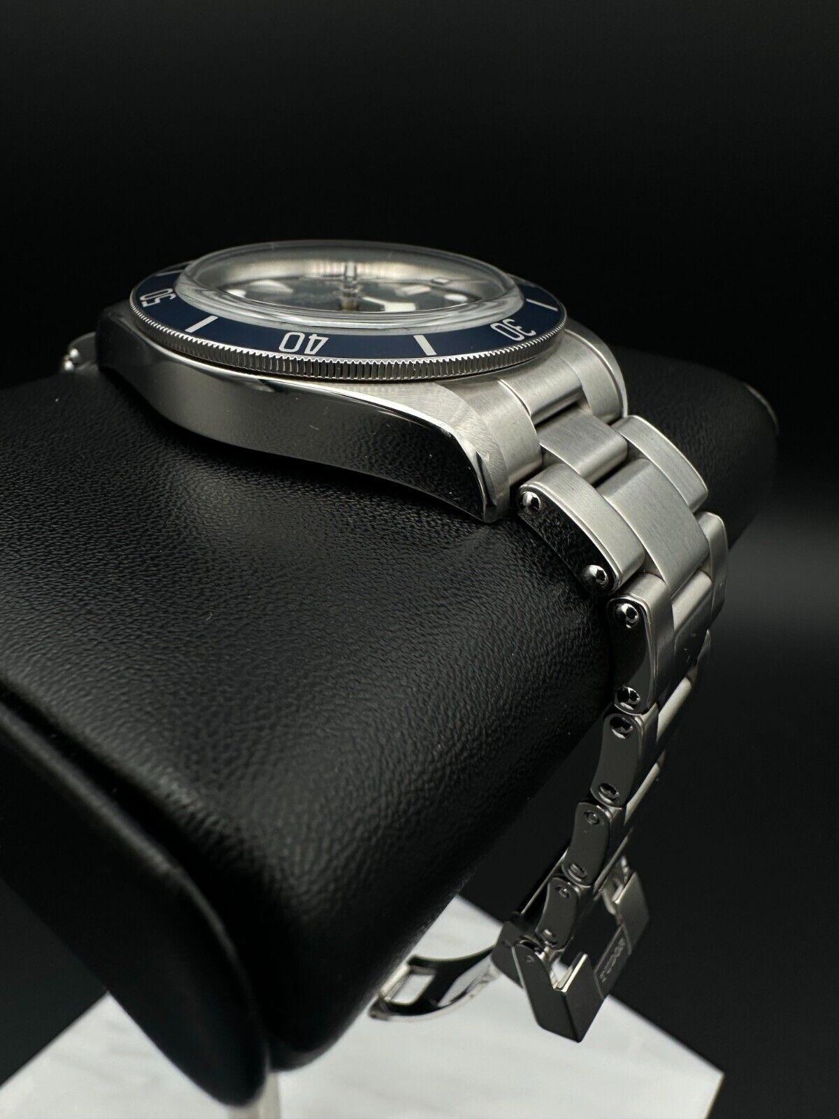 Tudor Black Bay Fifty-Eight Ref. 79030B Stainless Steel 39mm Automatic Watch from 2020, featuring a blue dial, unidirectional rotatable bezel with a 60-minute graduated disc in matte blue anodized aluminum, and silver gilded markings, paired with a Tudor stainless steel bracelet, in fair condition with obvious signs of wear, available at The Watch Trader, Madison, CT.