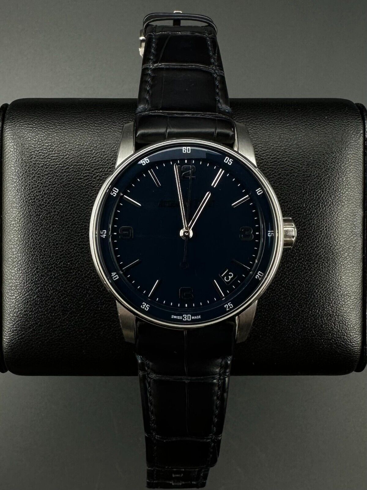 Audemars Piguet Code 11.59 15210BC, 41mm 18K white gold case with blue dial and black leather strap with blue stitching. Fair condition with noticeable signs of wear. Watch only. Available at The Watch Trader, Madison, Connecticut.