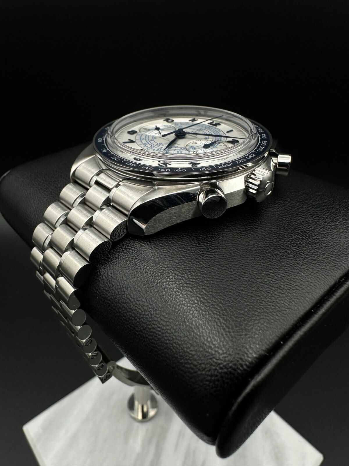 OMEGA Speedmaster Chronoscope 329.30.43.51.02.001 Automatic Watch, 2024 model, featuring a 43mm stainless steel case, silver dial, and blue anodized aluminum bezel ring with tachymeter scale. Comes with a stainless steel bracelet and fold-over clasp. Very good condition with minimal signs of wear. Available at The Watch Trader, Madison, Connecticut.