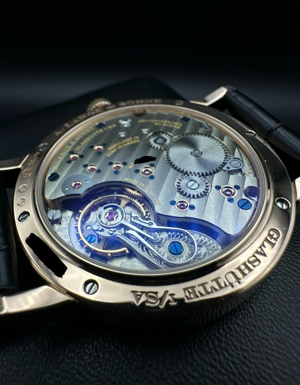 A. Lange & Söhne 1815 Up/Down 234.032, 39mm 18K rose gold case with silver dial, blued alpha-style hands, and power reserve indicator. Very good condition with minimal wear. Includes boxes, warranty booklet, microfiber cloths, and booklets. Available at The Watch Trader, Madison, Connecticut.