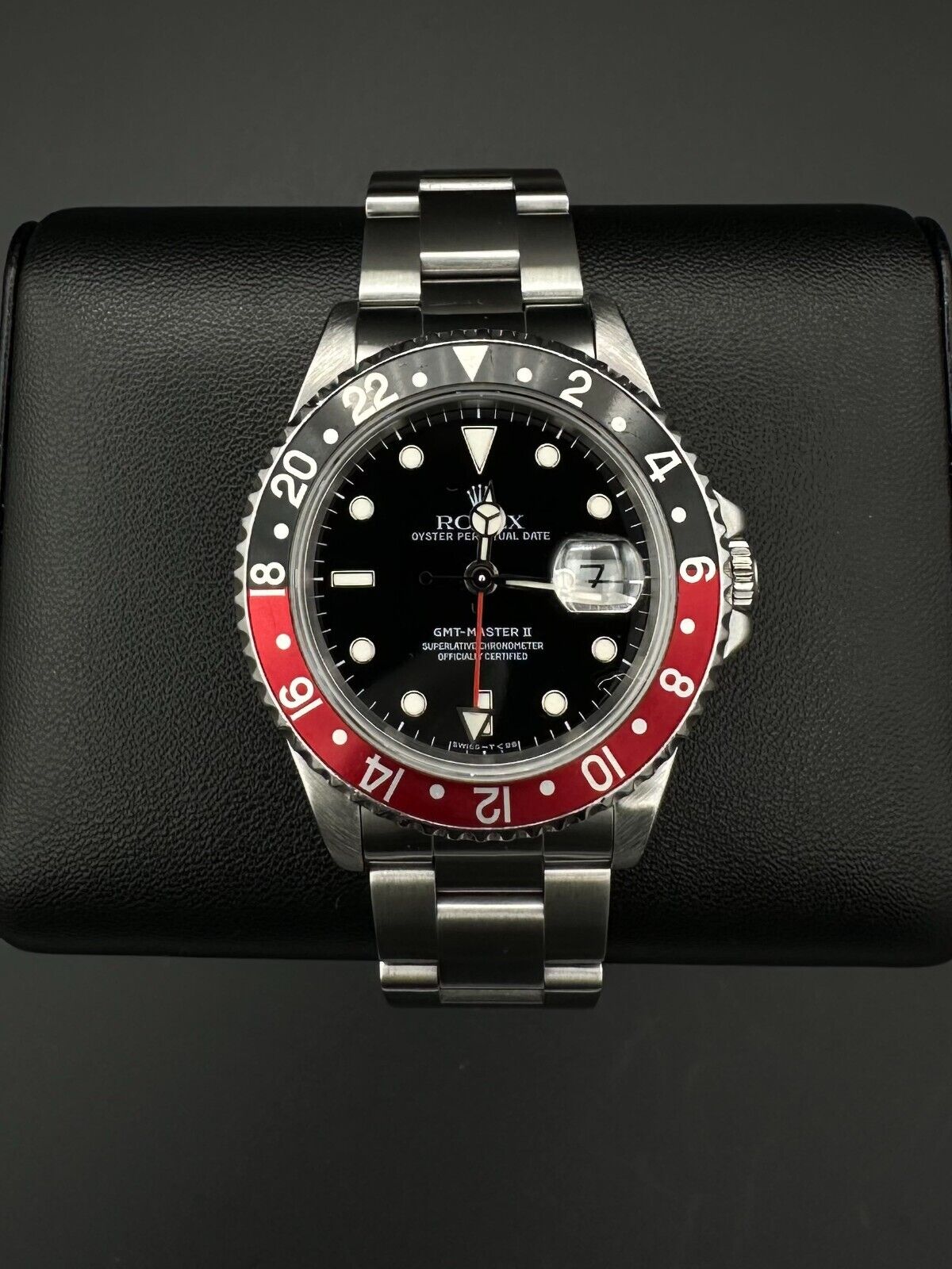 Rolex GMT-Master II men's automatic watch, model 16710, featuring the classic 'Coke' bezel and stainless steel oyster bracelet, 1993 release. This iconic 40mm timepiece combines functionality with a timeless design, perfect for collectors and enthusiasts of luxury watches. Available from The Watch Trader CT.