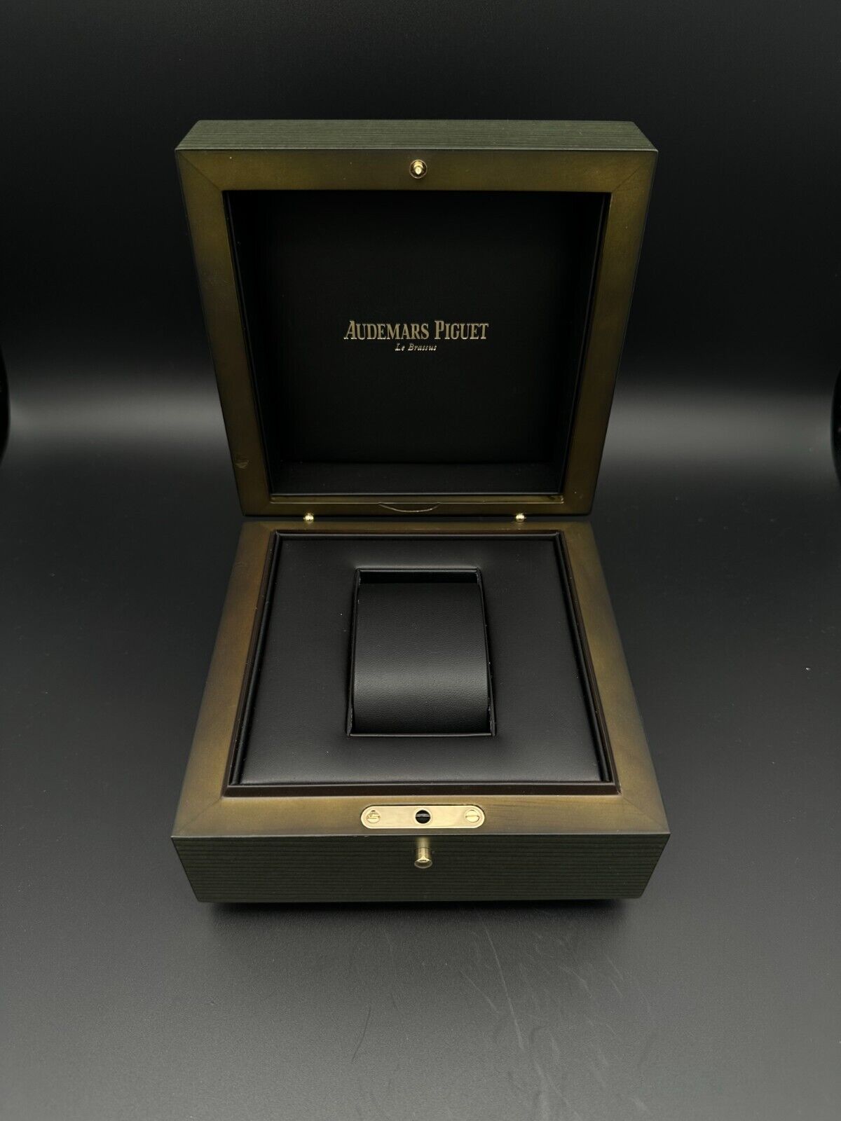 Cherry red dial Audemars Piguet men's watch with a white gold case, showcasing luxury craftsmanship and bold design. Ideal for watch collectors of high-end, unique timepieces. Sold by The Watch Trader CT.