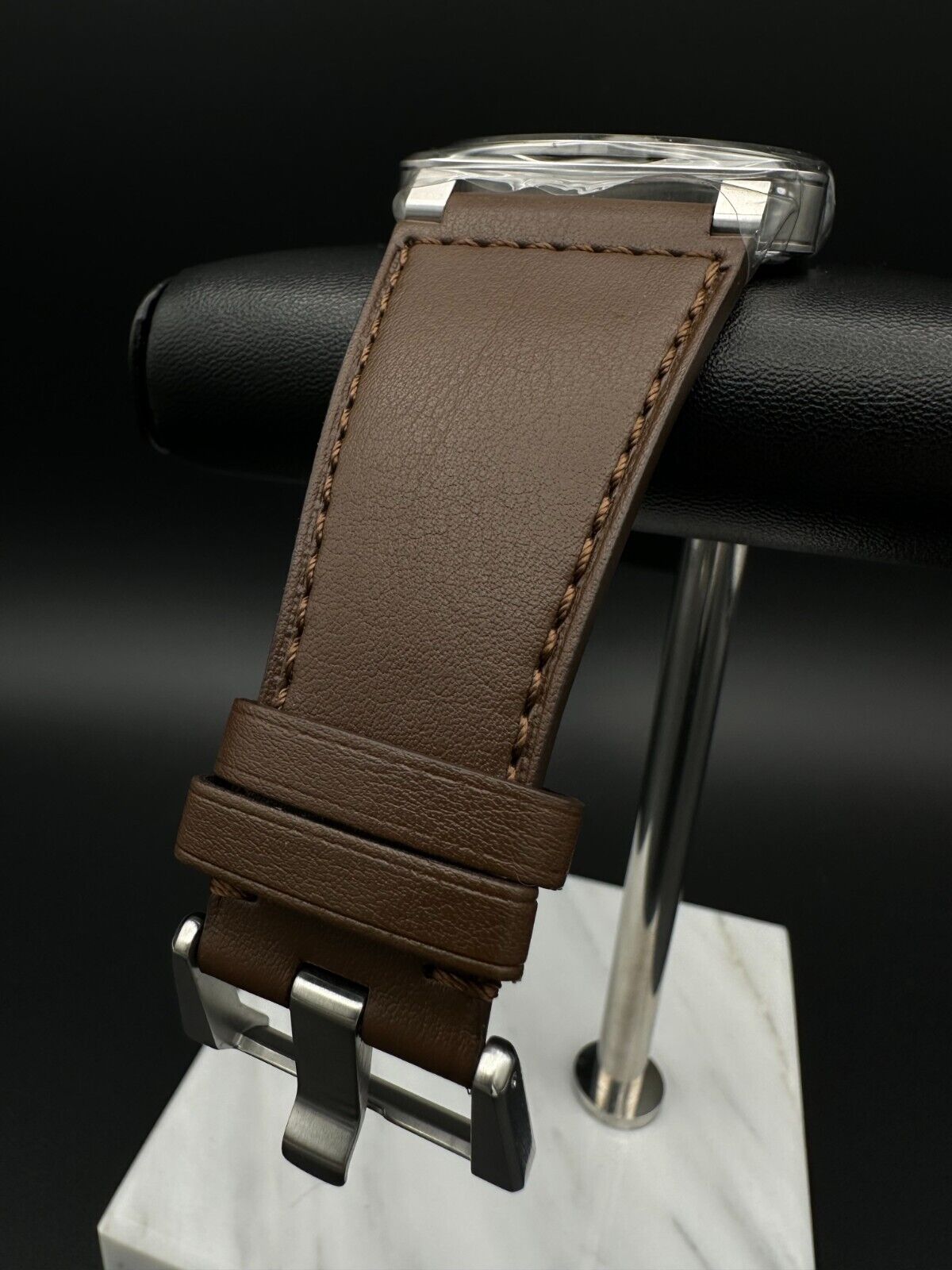 Bell & Ross BR-03 Golden Heritage 41mm men's watch featuring a striking brown sunray dial with gilt appliqué numerals and indices, metal skeletonized Super-LumiNova®-filled hands, and a smooth stainless steel bezel. The stainless steel case houses a 41mm diameter and is complemented by a brown calfskin leather strap. Brand new condition with original box, warranty card, user guide, and additional black canvas strap included. Available at The Watch Trader in Madison, Connecticut.