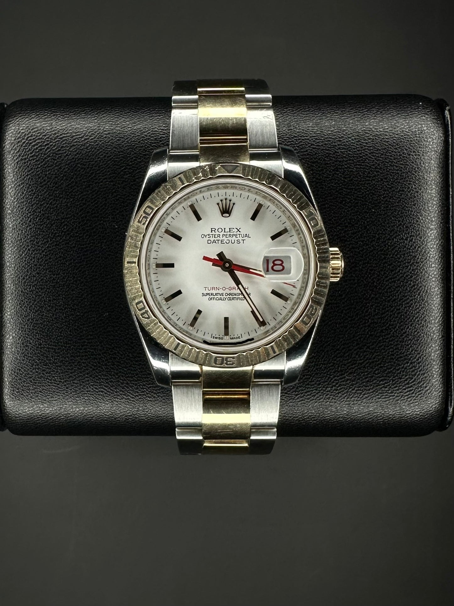 Rolex Datejust Turn-O-Graph 116261 men's automatic watch, featuring a 36mm stainless steel and rose gold case with a classic Oyster bracelet. This elegant timepiece combines the iconic Datejust design with a rotating bezel, ideal for collectors seeking a versatile luxury watch. Available from The Watch Trader CT.