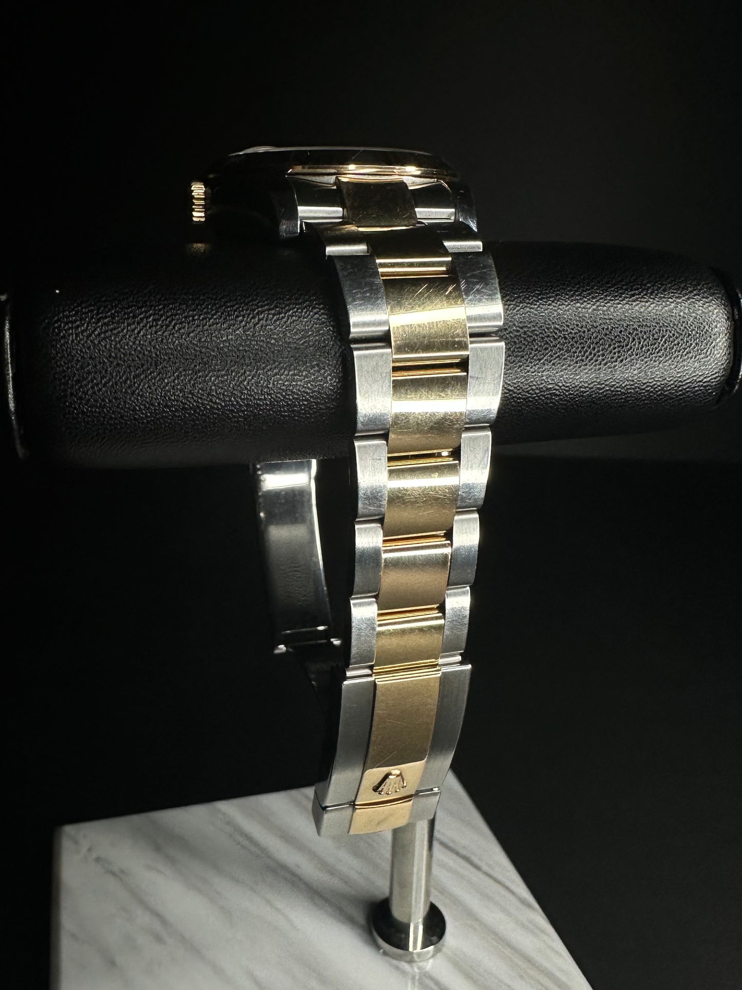 Rolex Datejust Turn-O-Graph 116261 men's automatic watch, featuring a 36mm stainless steel and rose gold case with a classic Oyster bracelet. This elegant timepiece combines the iconic Datejust design with a rotating bezel, ideal for collectors seeking a versatile luxury watch. Available from The Watch Trader CT.