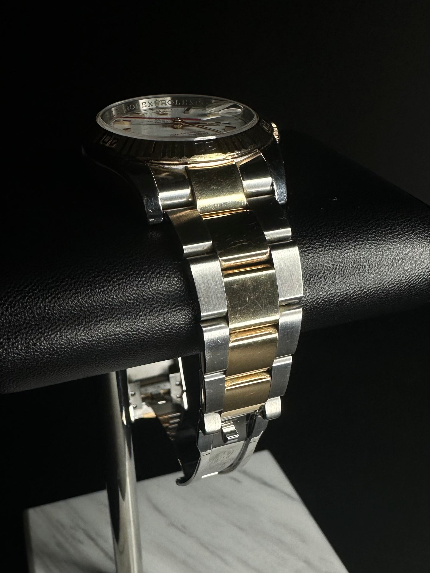Rolex Datejust Turn-O-Graph 116261 men's automatic watch, featuring a 36mm stainless steel and rose gold case with a classic Oyster bracelet. This elegant timepiece combines the iconic Datejust design with a rotating bezel, ideal for collectors seeking a versatile luxury watch. Available from The Watch Trader CT.