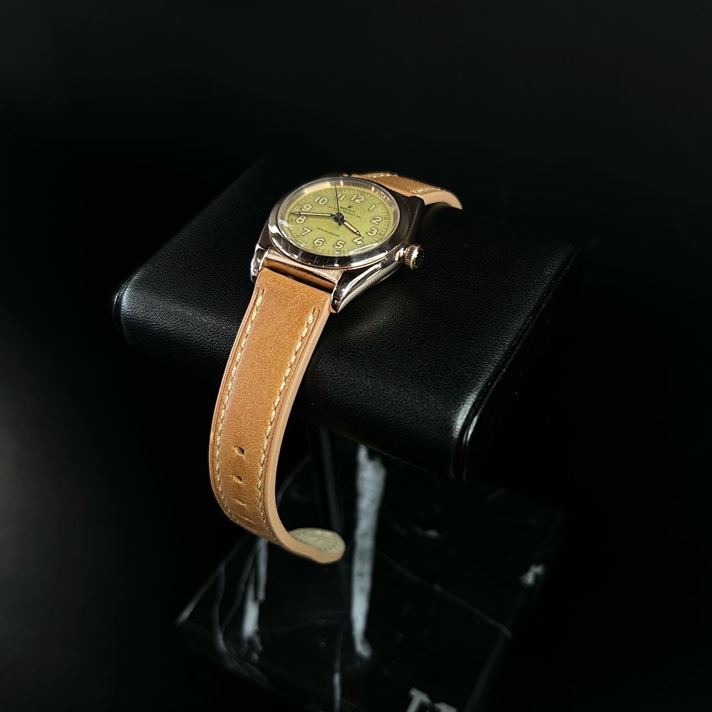 Rolex Oyster Perpetual 'Bubble Back' watch in 14kt rose gold, reference 3131, featuring a classic design with distinctive rounded case and vintage charm. This elegant timepiece is perfect for collectors and enthusiasts of iconic luxury watches. Available from The Watch Trader CT.