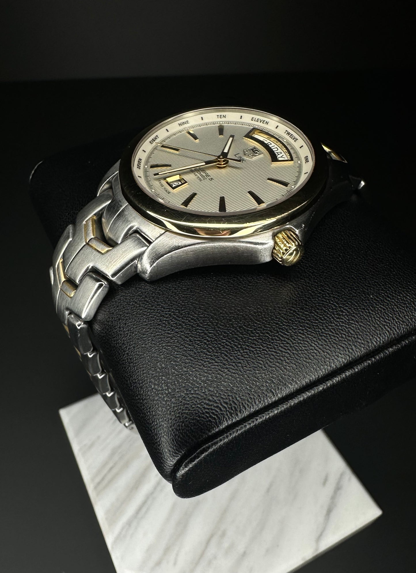 Tag Heuer Link automatic watch, model WJF2050, with gold and stainless steel bracelet and silver dial, 2018 release. A refined 39mm timepiece combining luxury and durability, ideal for enthusiasts of classic, high-quality watches. Available from The Watch Trader CT.