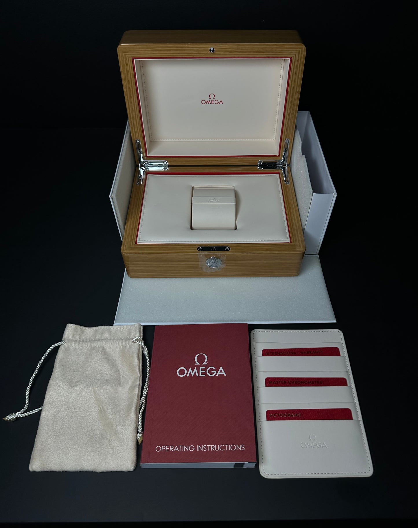 OMEGA Seamaster Aqua Terra 150M Worldtimer Ref. 220.10.43.22.03.001 Automatic Watch from 2022, featuring a 43mm stainless steel case, sun-brushed blue dial with vertical teak stripes, laser-ablated titanium Earth design, 24-hour glass ring, and global destinations display, paired with a stainless steel bracelet and butterfly clasp, in very good condition with little to no signs of wear, available at The Watch Trader, Madison, CT.