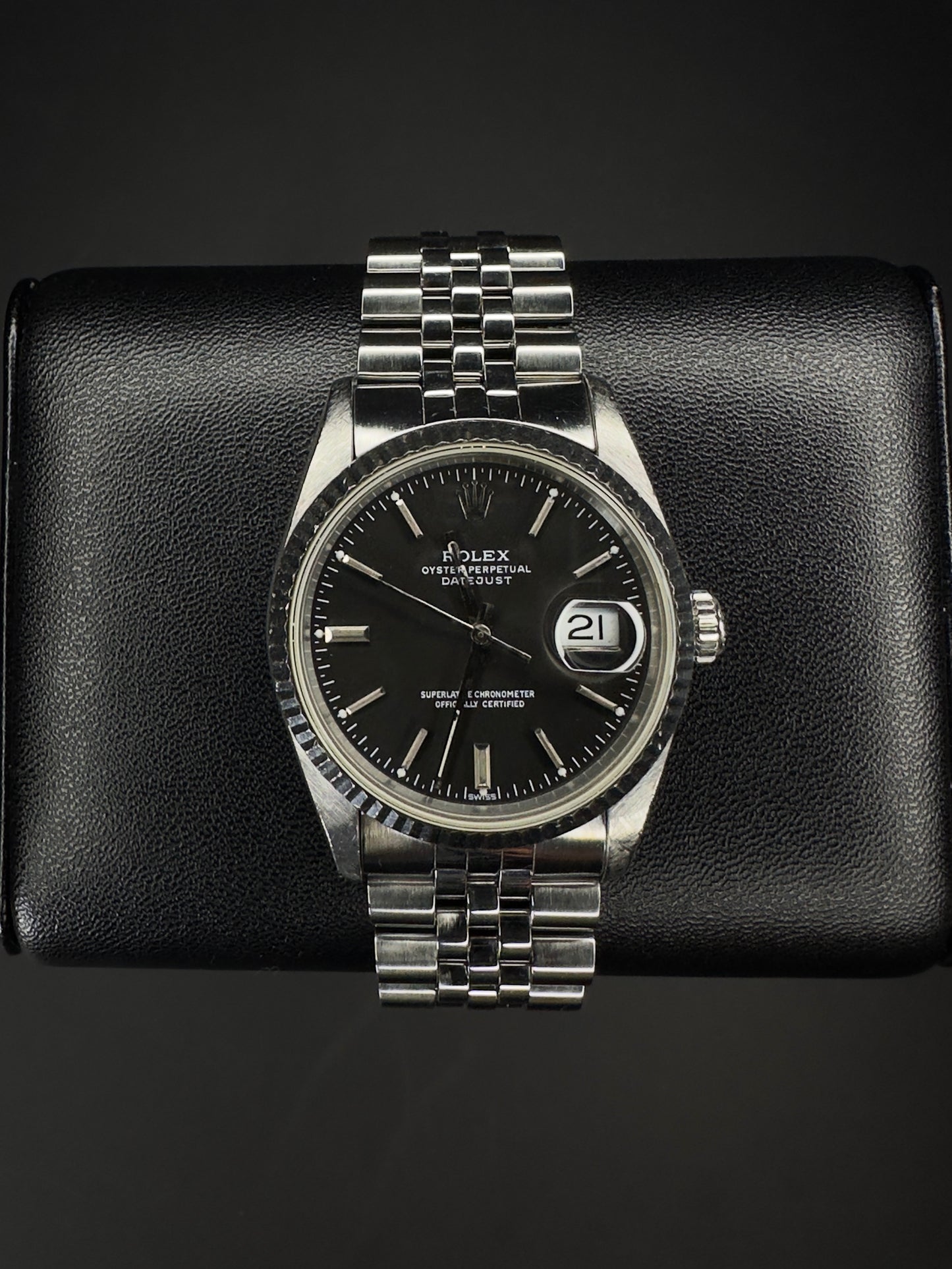 Rolex Datejust 36mm men's watch, model 16234, featuring a refined grey dial and stainless steel Jubilee bracelet, from 1991. This classic automatic timepiece combines timeless style with Rolex's renowned craftsmanship, ideal for collectors and enthusiasts seeking a vintage luxury watch. Available from The Watch Trader in Madison, Connecticut.