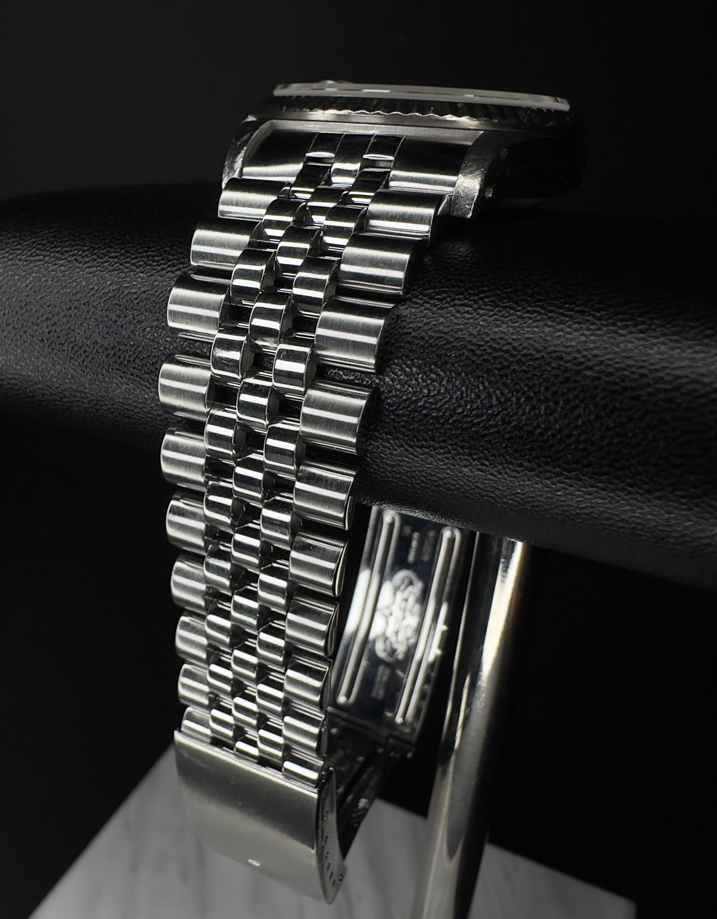 Rolex Datejust 36mm men's watch, model 16234, featuring a refined grey dial and stainless steel Jubilee bracelet, from 1991. This classic automatic timepiece combines timeless style with Rolex's renowned craftsmanship, ideal for collectors and enthusiasts seeking a vintage luxury watch. Available from The Watch Trader in Madison, Connecticut.