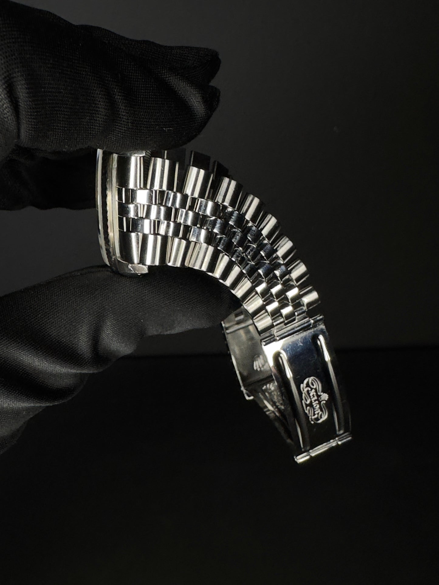 Rolex Datejust 36mm men's watch, model 16234, featuring a refined grey dial and stainless steel Jubilee bracelet, from 1991. This classic automatic timepiece combines timeless style with Rolex's renowned craftsmanship, ideal for collectors and enthusiasts seeking a vintage luxury watch. Available from The Watch Trader in Madison, Connecticut.