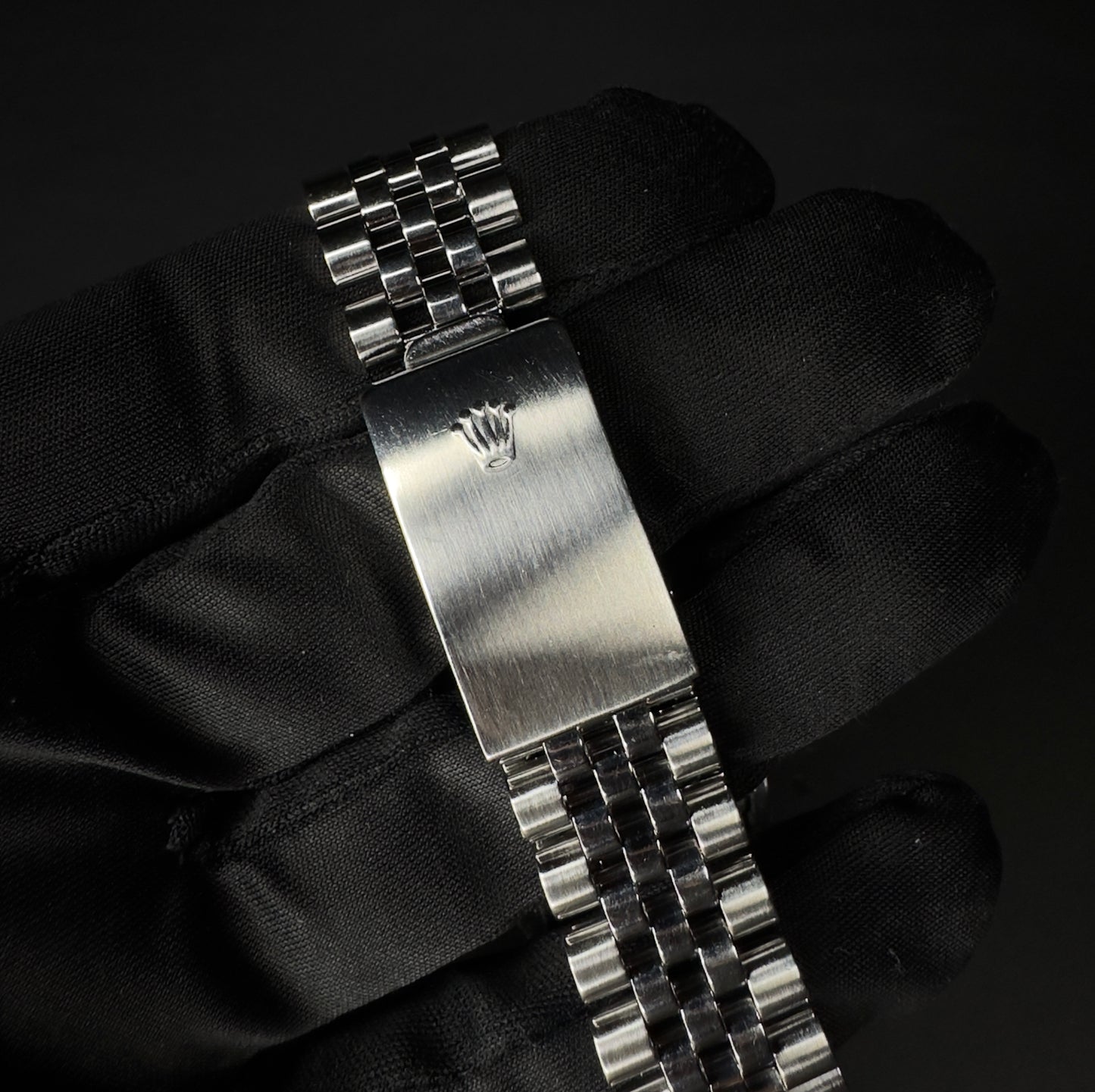 Rolex Datejust 36mm men's watch, model 16234, featuring a refined grey dial and stainless steel Jubilee bracelet, from 1991. This classic automatic timepiece combines timeless style with Rolex's renowned craftsmanship, ideal for collectors and enthusiasts seeking a vintage luxury watch. Available from The Watch Trader in Madison, Connecticut.