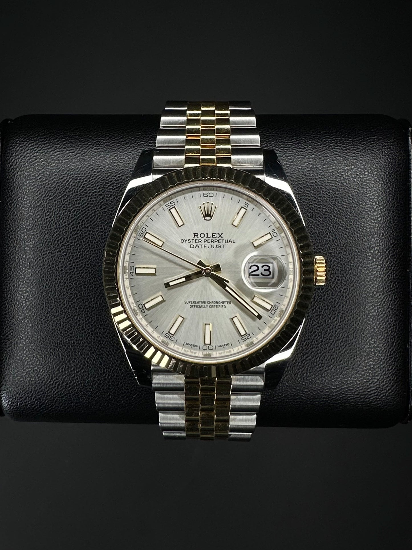 Rolex Datejust 41mm automatic watch, model 126333, featuring a two-tone yellow gold and stainless steel case with a silver dial, 2019 release. This elegant timepiece combines classic design with modern size, perfect for collectors seeking a versatile and luxurious watch. Available from The Watch Trader CT.