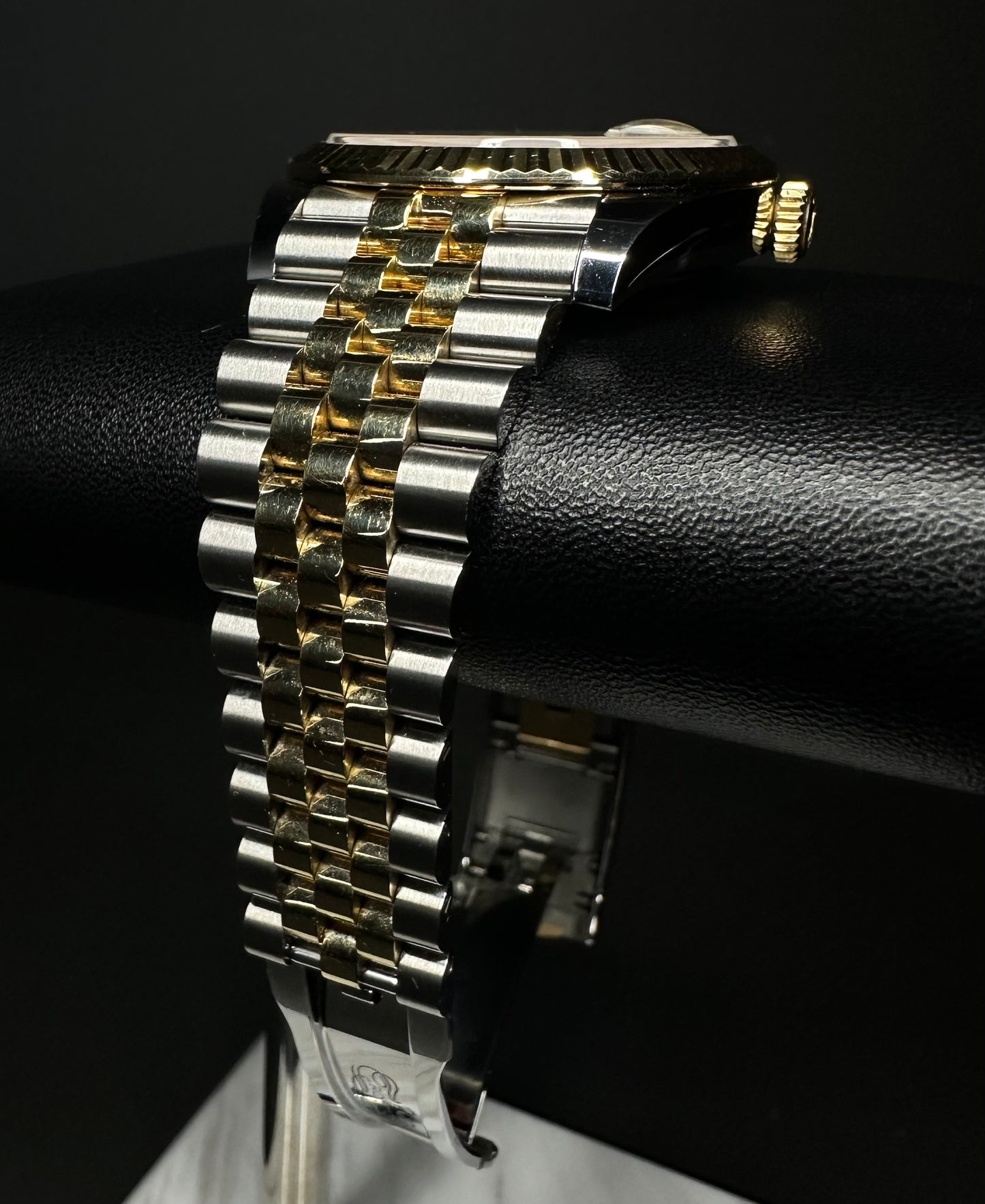 Rolex Datejust 41mm automatic watch, model 126333, featuring a two-tone yellow gold and stainless steel case with a silver dial, 2019 release. This elegant timepiece combines classic design with modern size, perfect for collectors seeking a versatile and luxurious watch. Available from The Watch Trader CT.