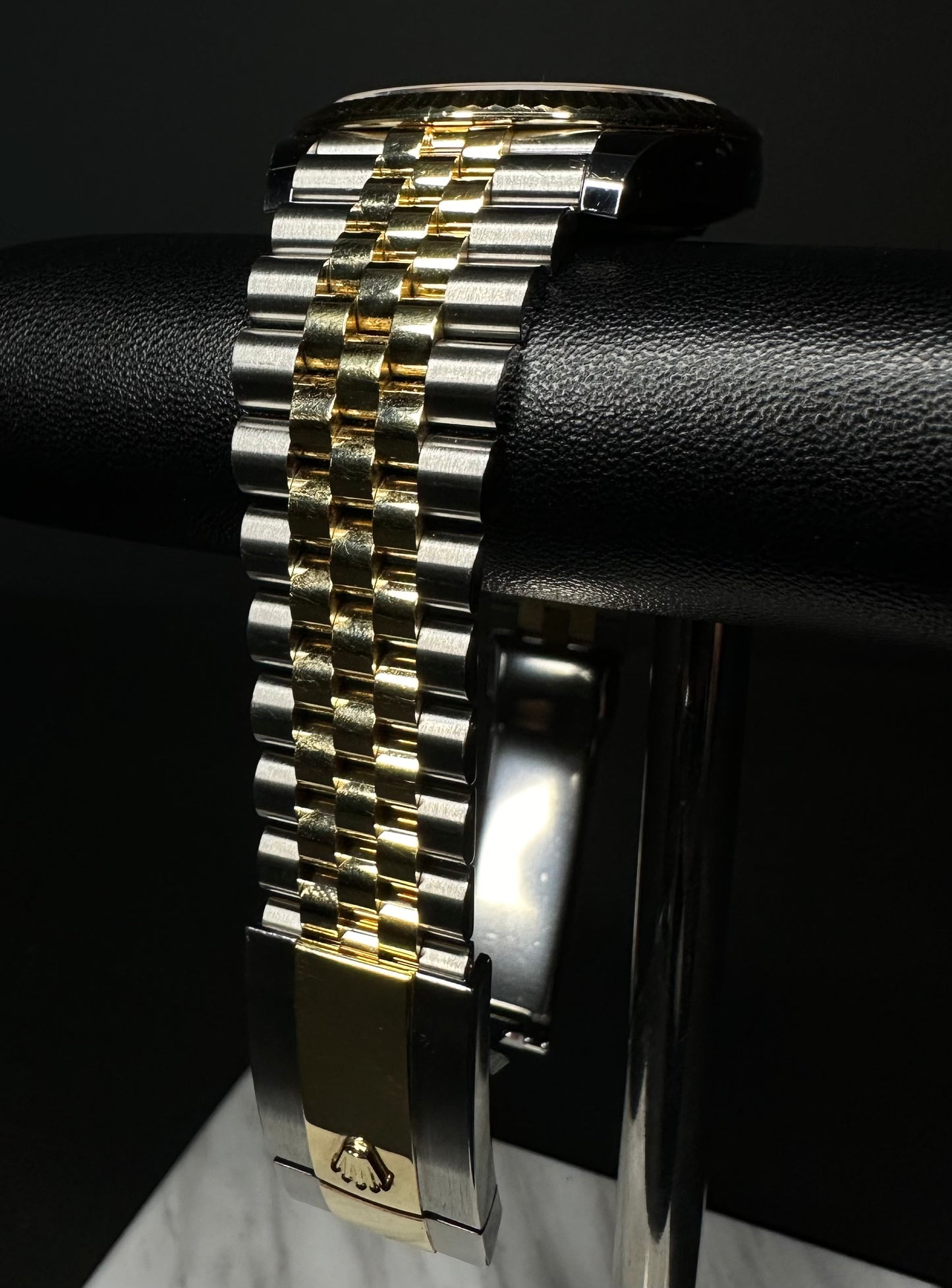 Rolex Datejust 41mm automatic watch, model 126333, featuring a two-tone yellow gold and stainless steel case with a silver dial, 2019 release. This elegant timepiece combines classic design with modern size, perfect for collectors seeking a versatile and luxurious watch. Available from The Watch Trader CT.