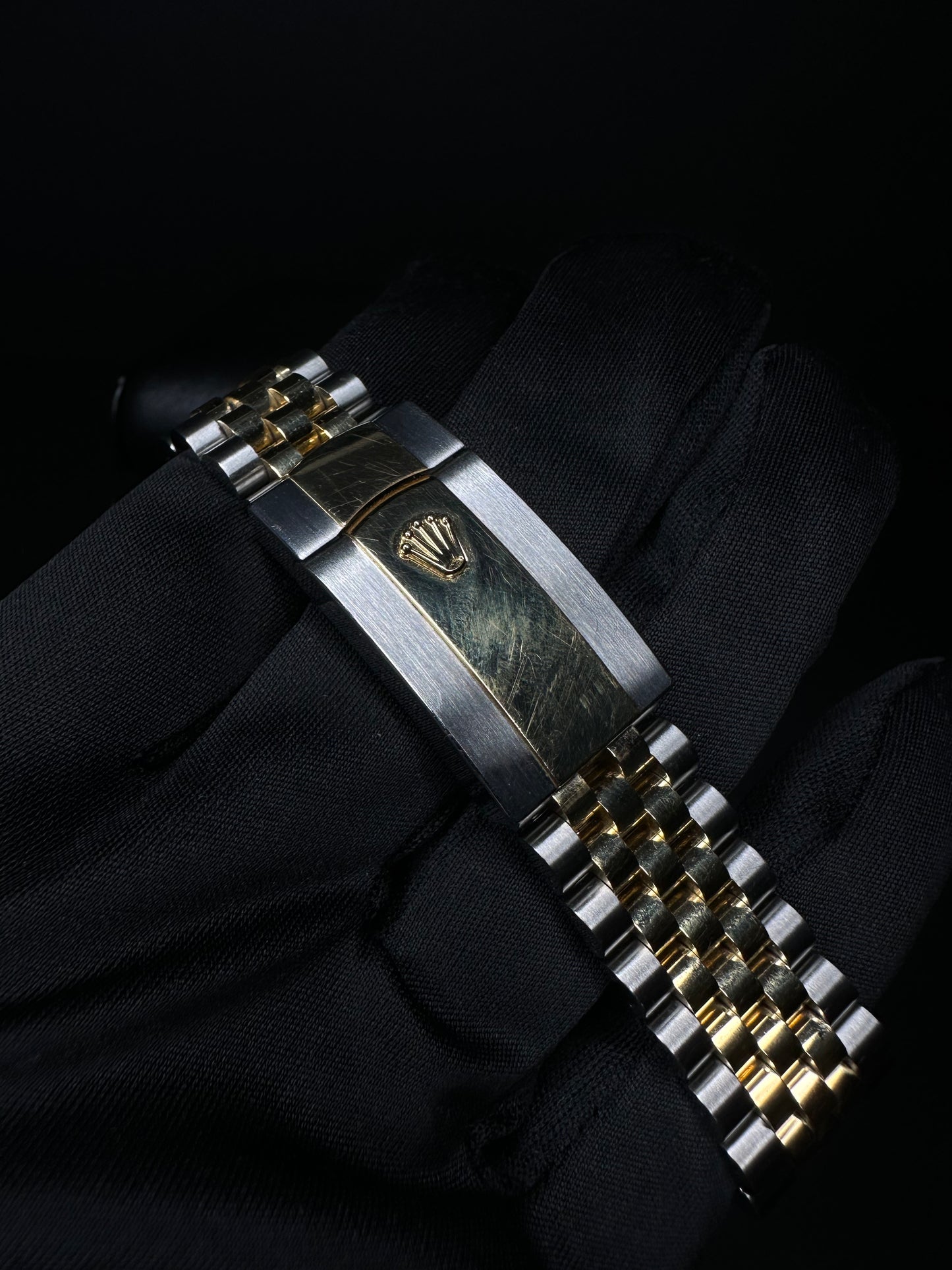 Rolex Datejust 41mm automatic watch, model 126333, featuring a two-tone yellow gold and stainless steel case with a silver dial, 2019 release. This elegant timepiece combines classic design with modern size, perfect for collectors seeking a versatile and luxurious watch. Available from The Watch Trader CT.