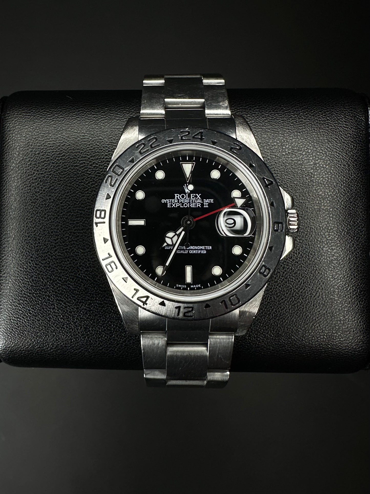 Rolex Explorer II 40mm automatic watch, model 16570, featuring a classic black dial and stainless steel case, 2000 release. This iconic timepiece combines durability and style, perfect for explorers and collectors seeking a reliable, versatile luxury watch. Available from The Watch Trader CT.